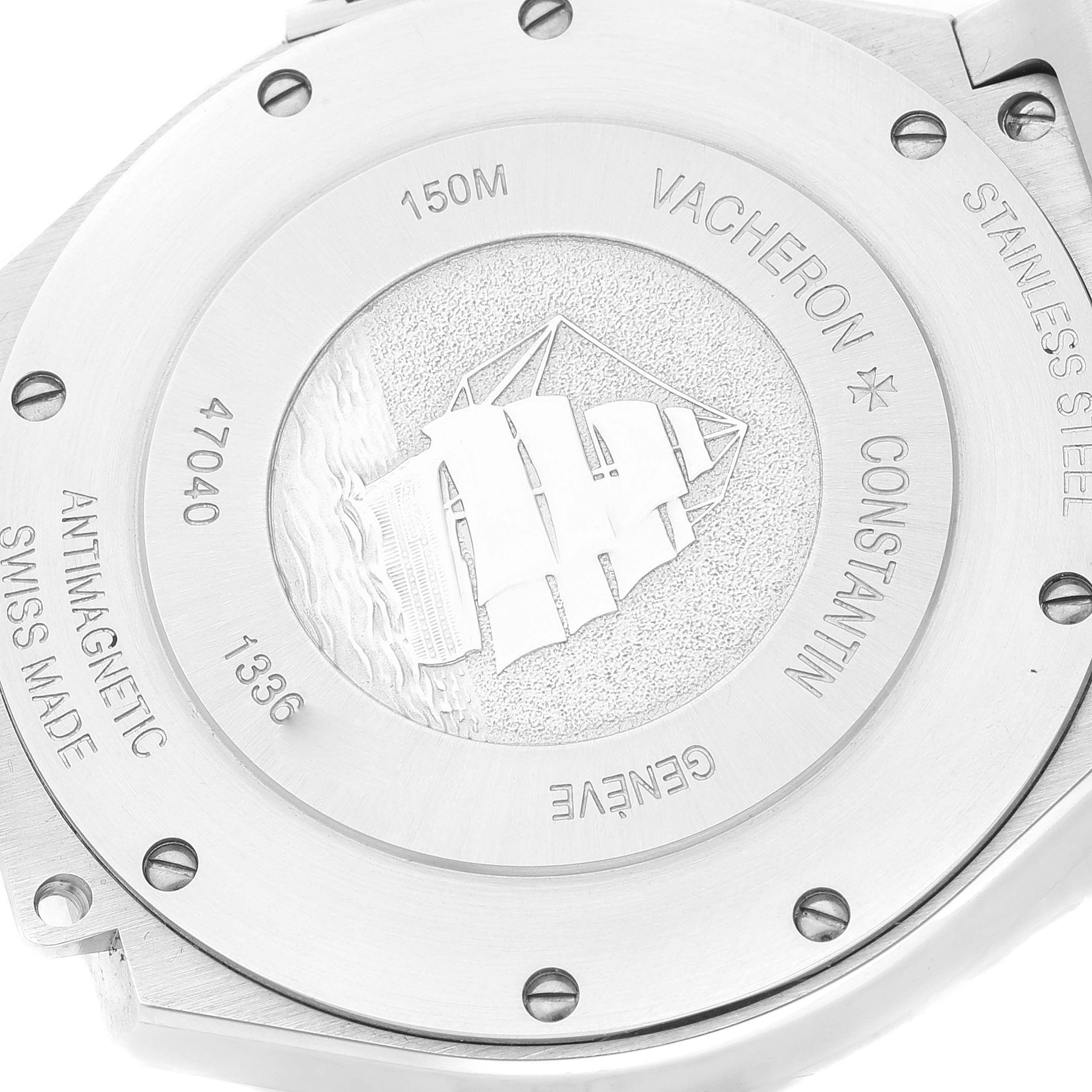 The image shows the stainless steel case back of the Vacheron Constantin Overseas 47040B01A-9093 Men's Stainless Steel Silver Dial 47040B01A-9093 Men's Stainless Steel Silver Dial model, featuring a ship engraving.