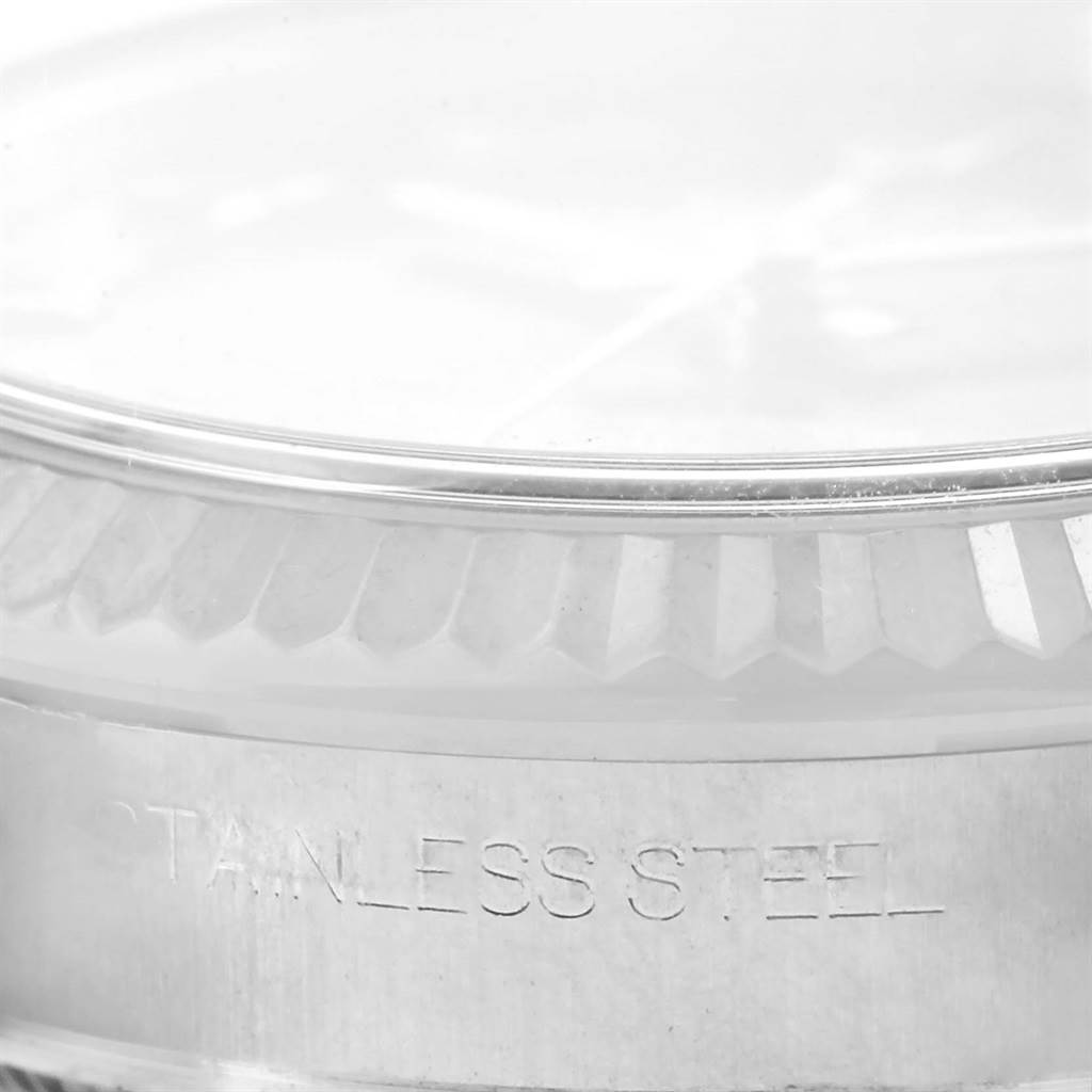 The image shows a close-up of the stainless steel casing and fluted bezel of the Rolex 178274 Women's Stainless Steel Brown Dial 178274 Women's Stainless Steel Brown Dial Datejust Midsize Steel White Gold Brown Diamond Dial Watch 178274.