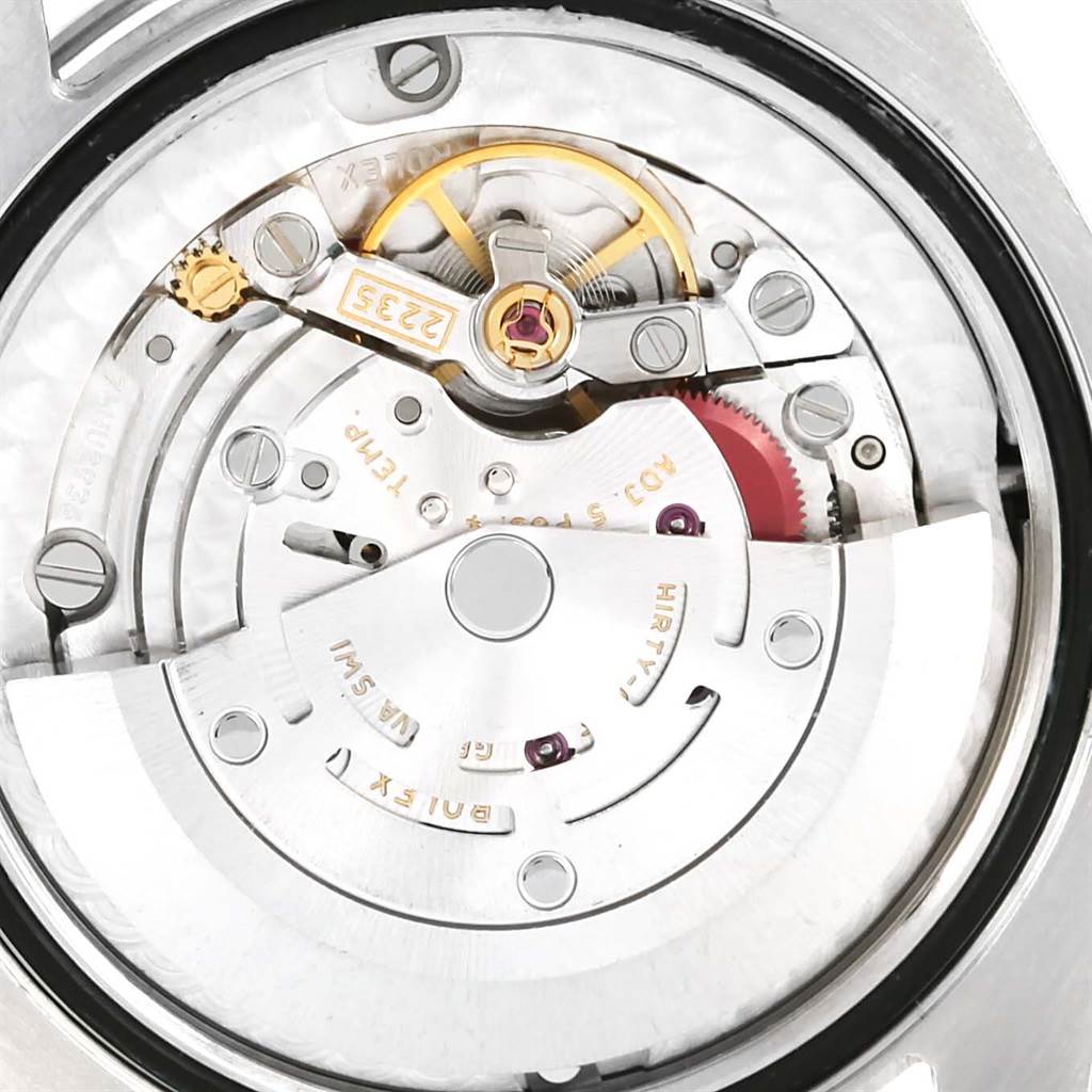 This image shows the intricate inner mechanism and movement parts of a Rolex 178274 Women's Stainless Steel Brown Dial 178274 Women's Stainless Steel Brown Dial Datejust Midsize Steel White Gold Brown Diamond Dial Watch 178274.