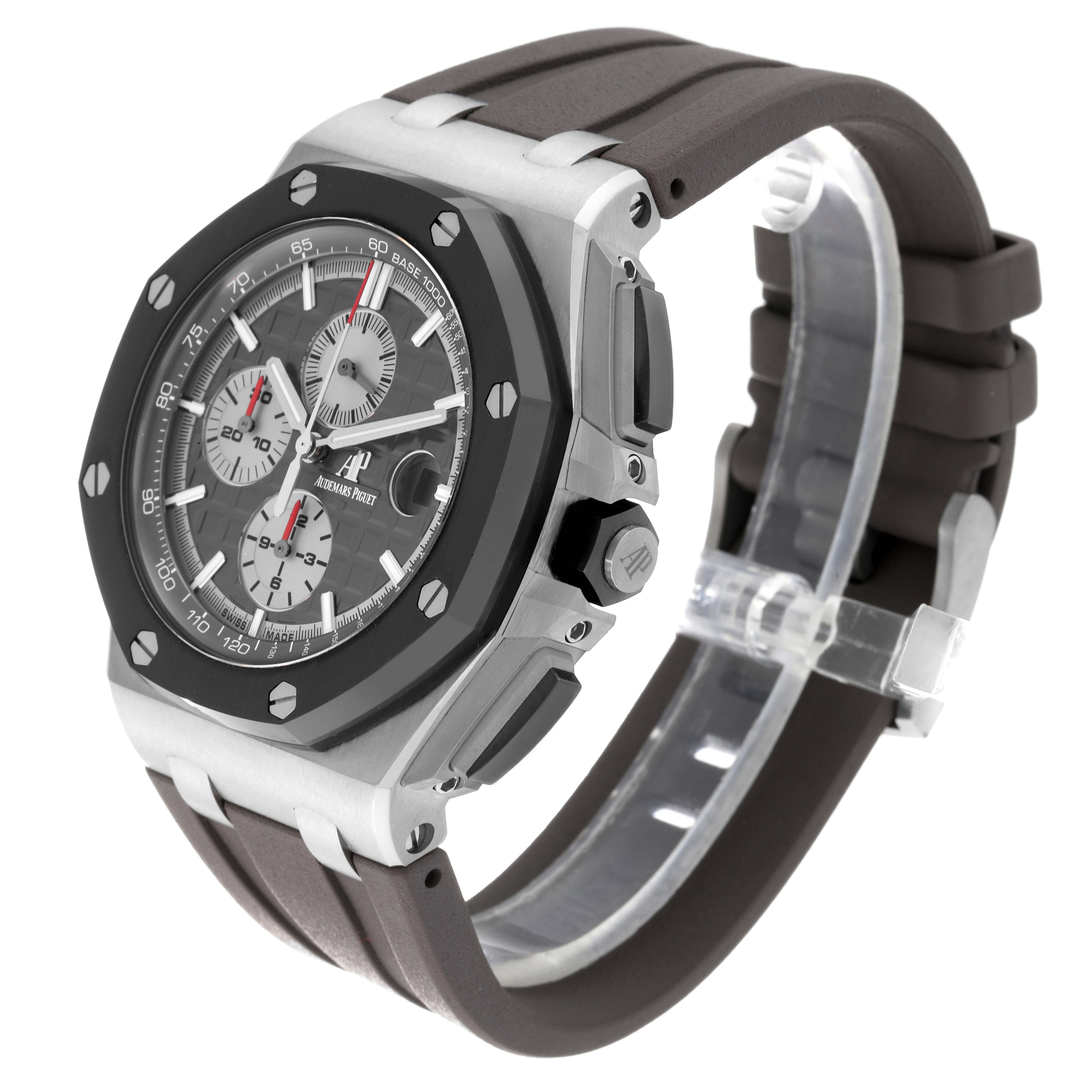 The image shows an Audemars Piguet Royal Oak Offshore 26400IO.OO.A004CA.01.A Men's Titanium Grey Dial 26400IO.OO.A004CA.01.A Men's Titanium Grey Dial watch from a three-quarter angle, highlighting its face, bezel, and strap.