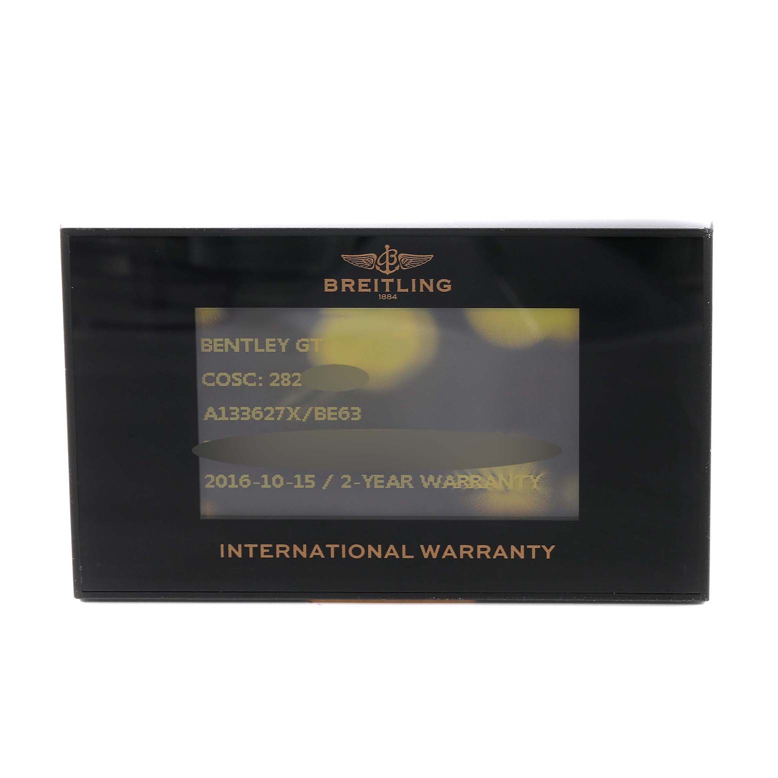 The image shows the warranty card for the Bentley model by Breitling at a straight-on angle.