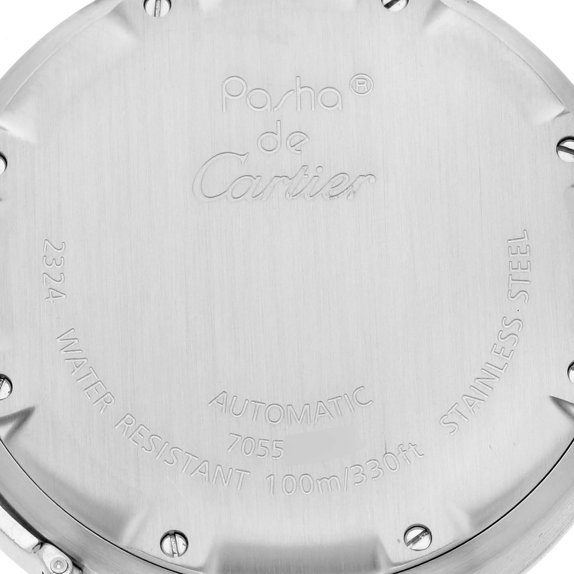 This image shows the back cover of the Cartier Pasha W31076M7 Women's Stainless Steel Black Dial W31076M7 Women's Stainless Steel Black Dial watch, highlighting the inscriptions and screws.