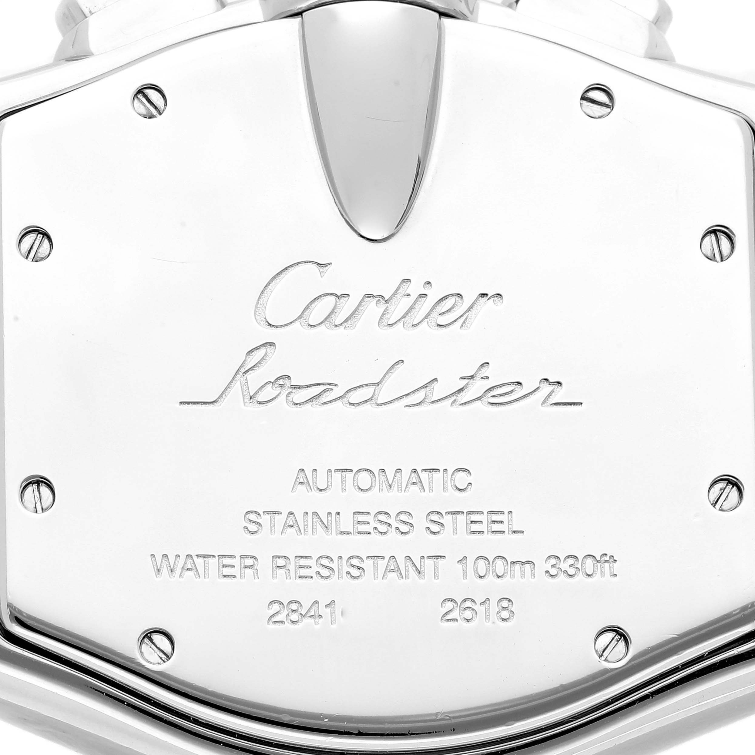 This image shows the stainless steel back case of the Cartier Roadster W62007X6 Men's Stainless Steel Black Dial W62007X6 Men's Stainless Steel Black Dial watch with engraving details.
