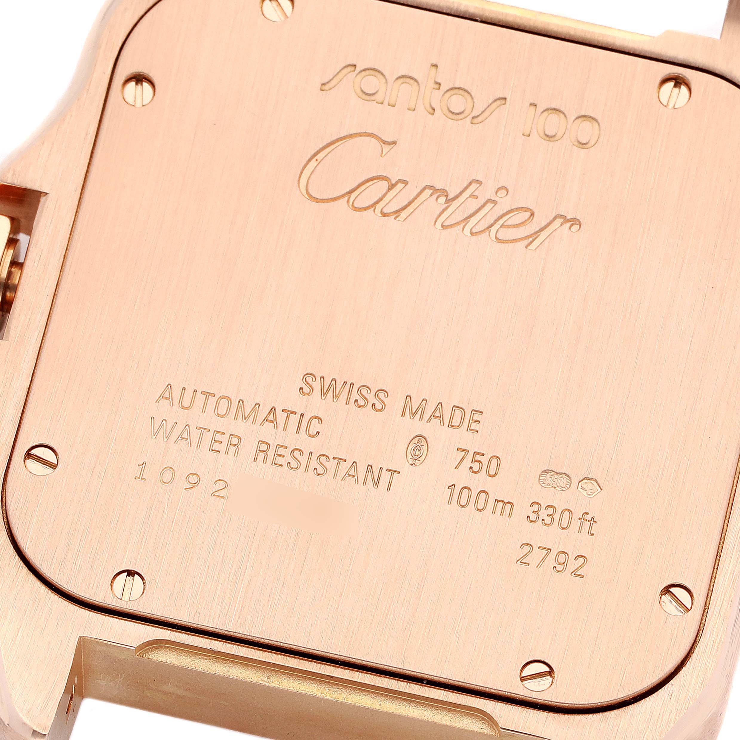 The image shows the case back of a Cartier Santos W20095Y1 Men's Rose Gold Silver Dial W20095Y1 Men's Rose Gold Silver Dial 100 watch, displaying engravings and specifications.