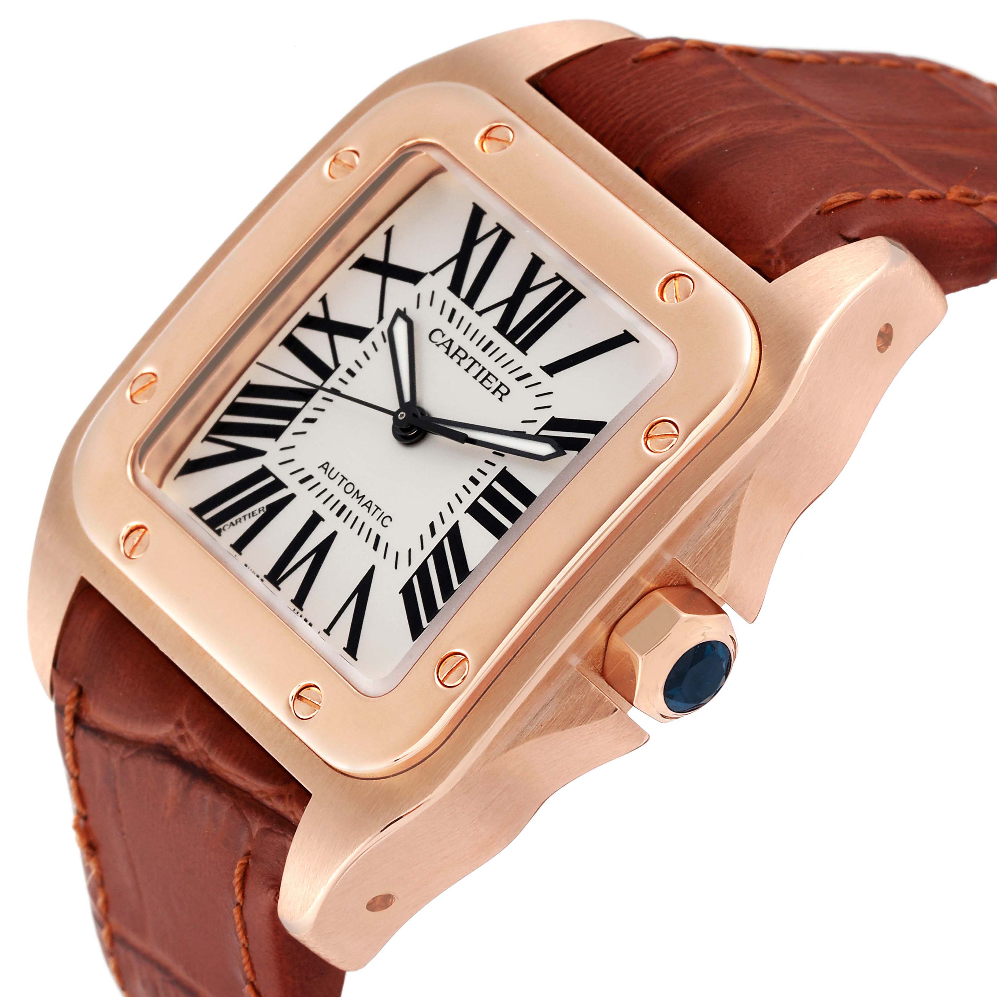 The image shows a Cartier Santos W20095Y1 Men's Rose Gold Silver Dial W20095Y1 Men's Rose Gold Silver Dial watch at a slight angle highlighting the dial, crown, bezel, and part of the leather strap.