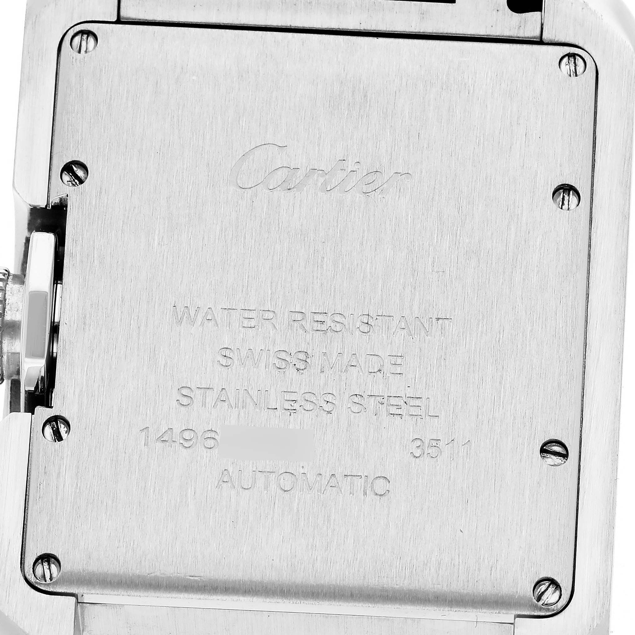 The image shows the back case of a Cartier Tank Anglaise W5310009 Men
s Stainless Steel Silver Dial W5310009 Men
s Stainless Steel Silver Dial watch, highlighting engravings and screws.