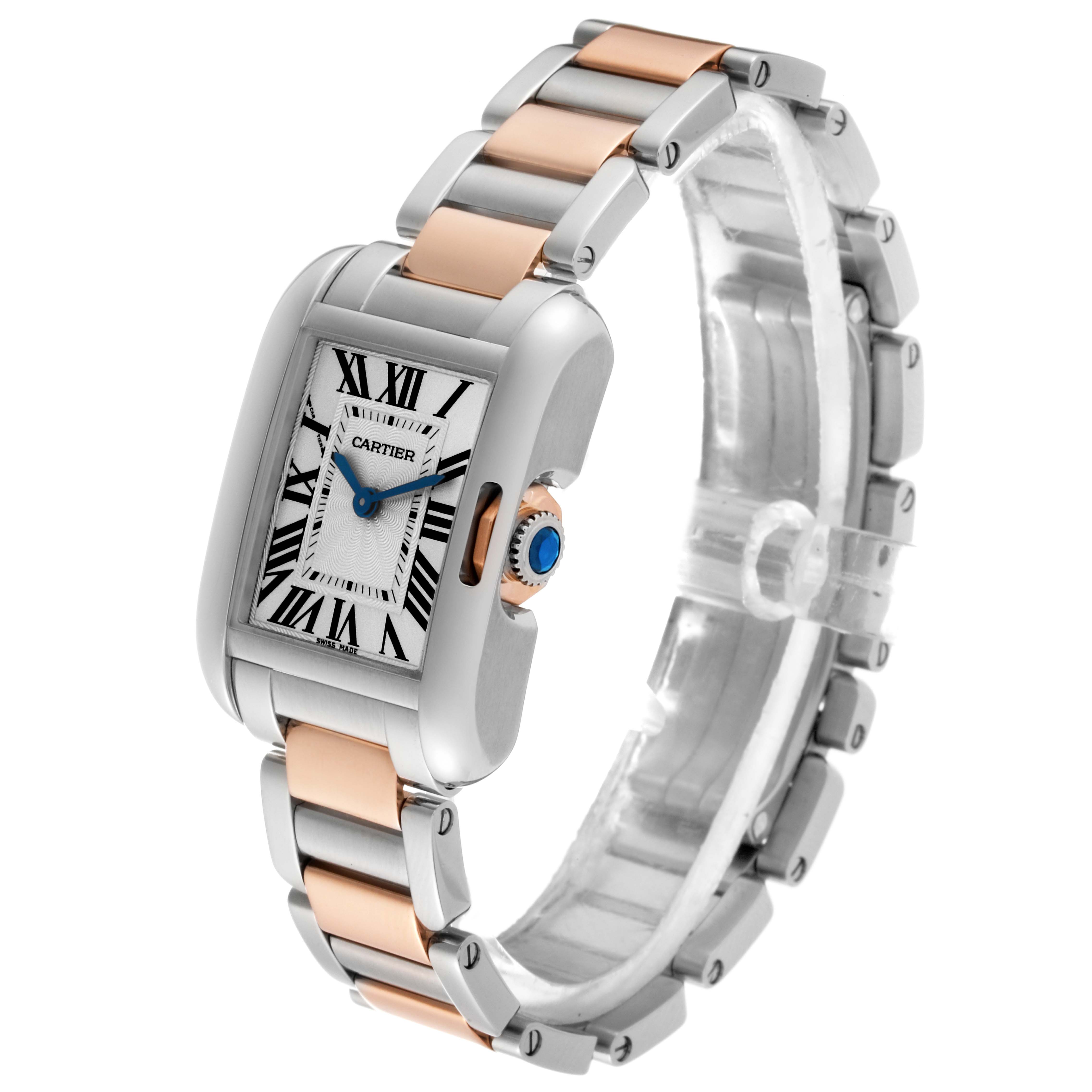 The Cartier Tank Anglaise W5310019 Women
s Steel and Gold (two tone) Silver Dial W5310019 Women
s Steel and Gold (two tone) Silver Dial watch is shown at an angle highlighting its two-tone metal bracelet, rectangular face, and crown with blue cabochon.
