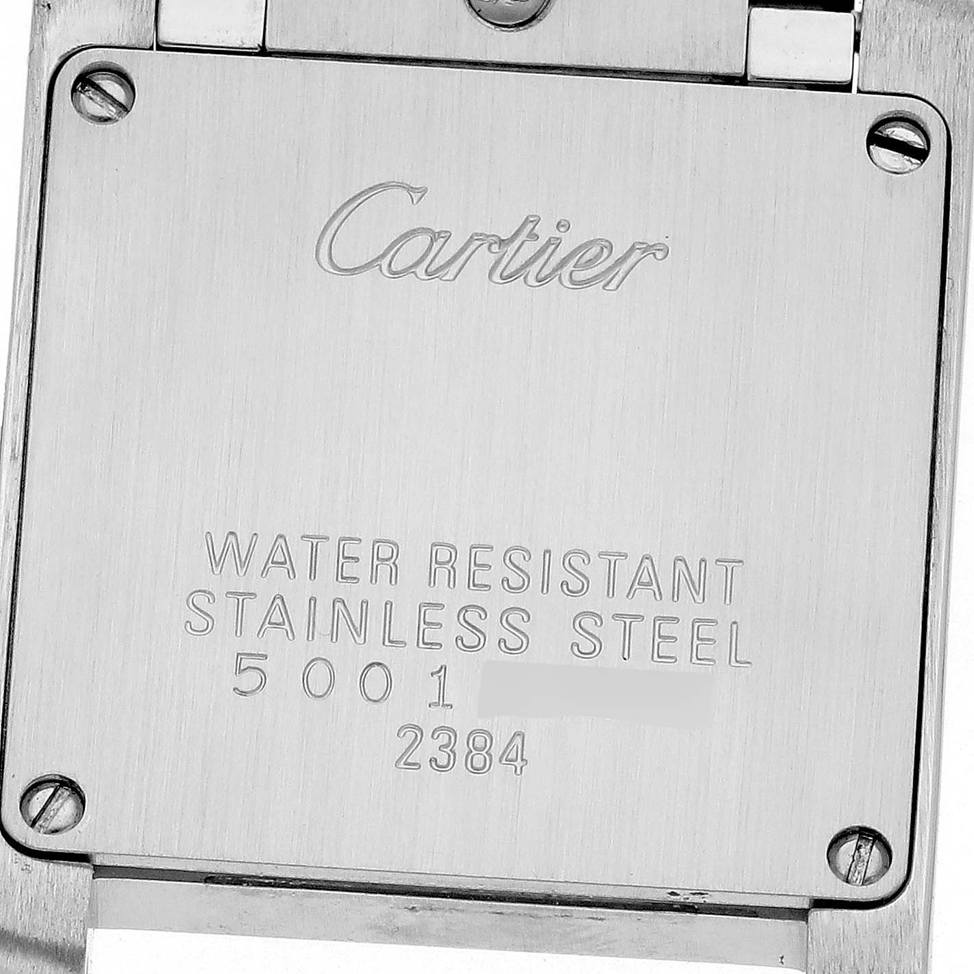 This image shows the back case of a Tank Francaise model by Cartier, displaying its water resistance and material details.