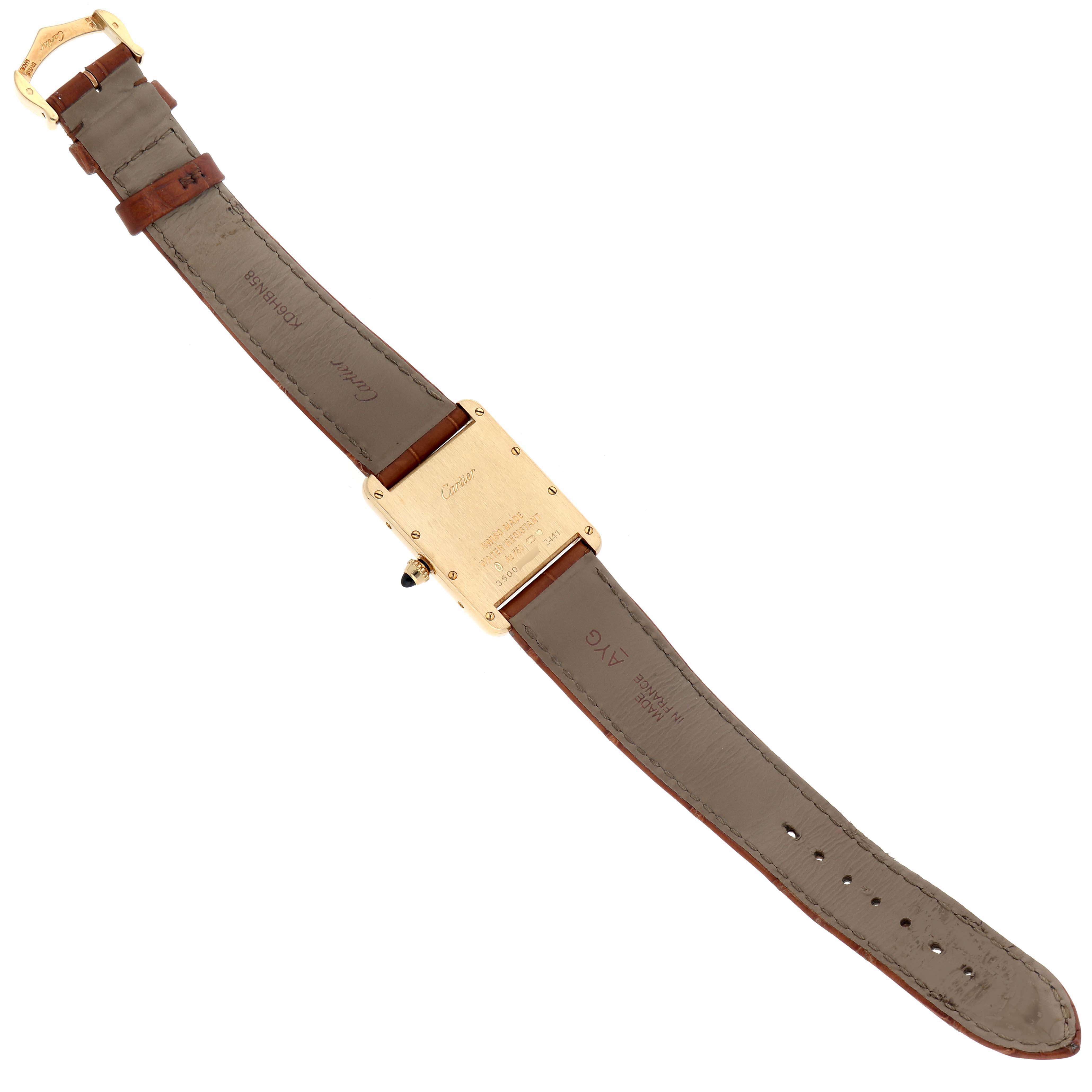 The image shows the back view of a Cartier Tank Louis W1529756 Men's Yellow Gold Silver Dial W1529756 Men's Yellow Gold Silver Dial watch, highlighting the case back, strap, and buckle.