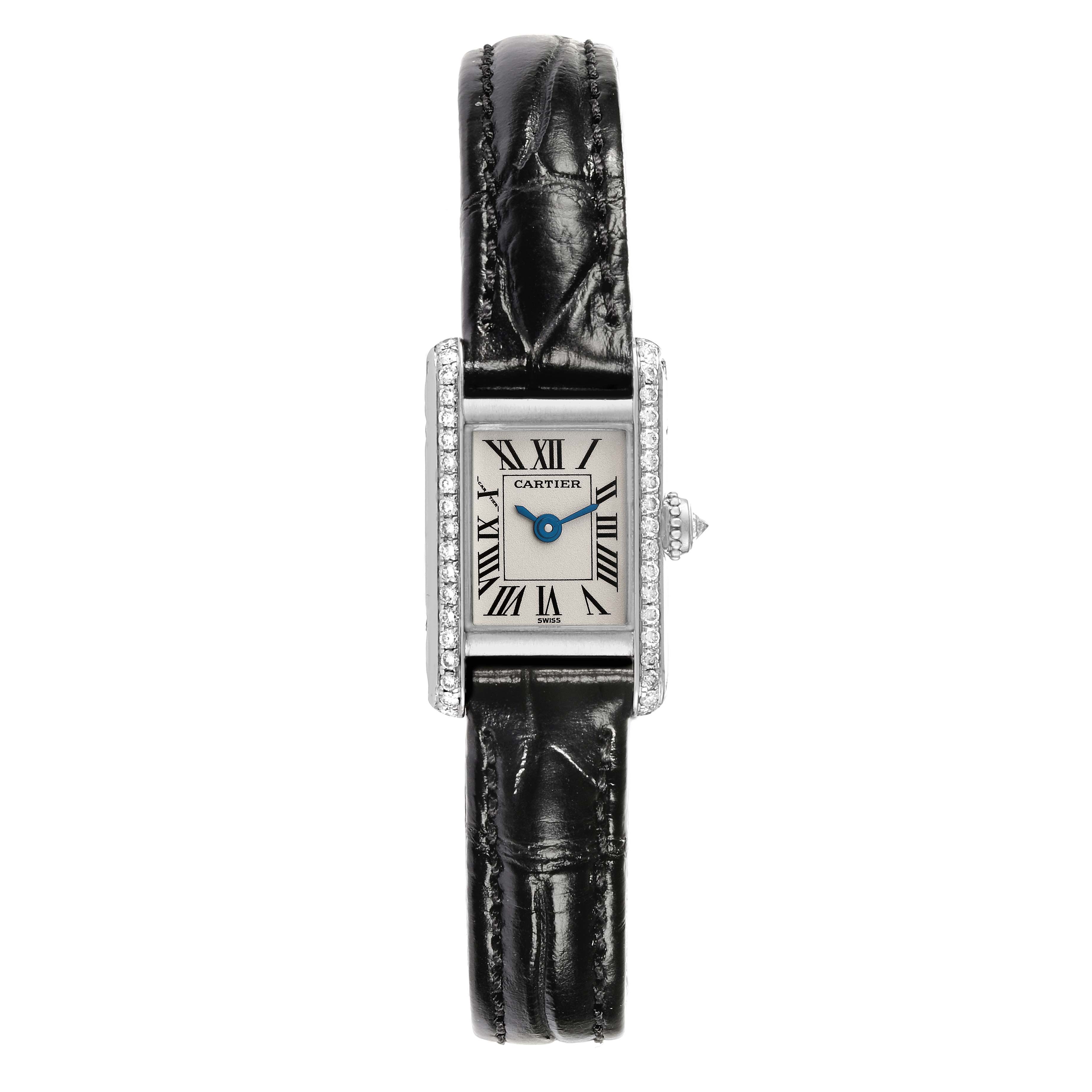 The Cartier Tank Americaine 1371 Women's White Gold Silver Dial 1371 Women's White Gold Silver Dial watch is shown from a front angle, displaying the face, diamond bezel, and black leather strap.