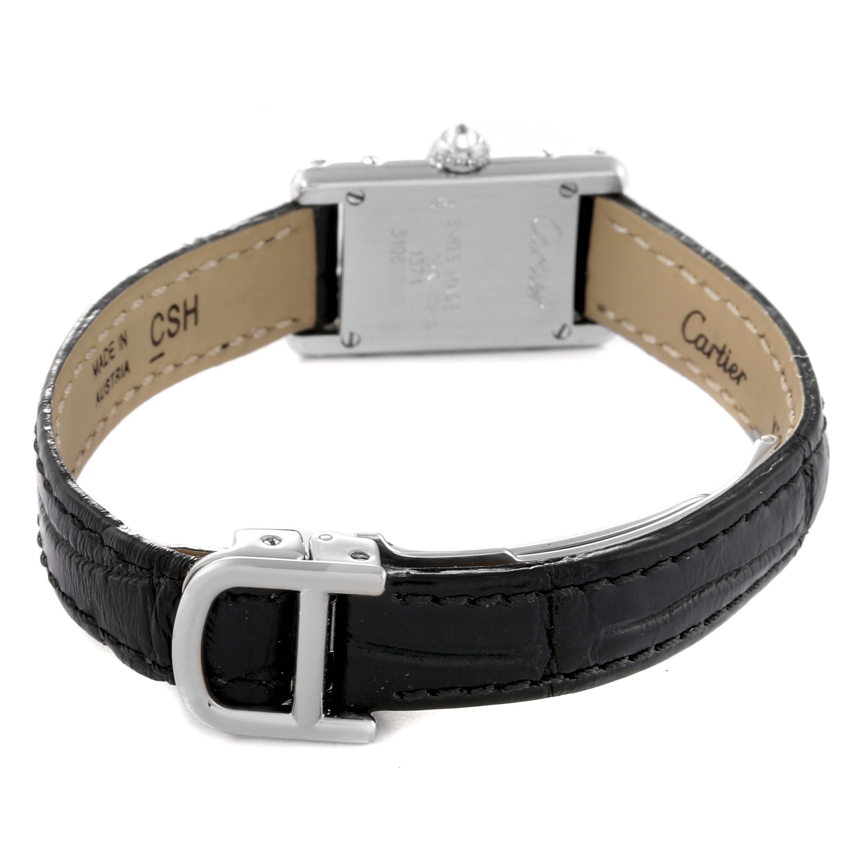 The image shows the back side of a Cartier Tank Americaine 1371 Women's White Gold Silver Dial 1371 Women's White Gold Silver Dial watch, including the leather strap, buckle, and case back.