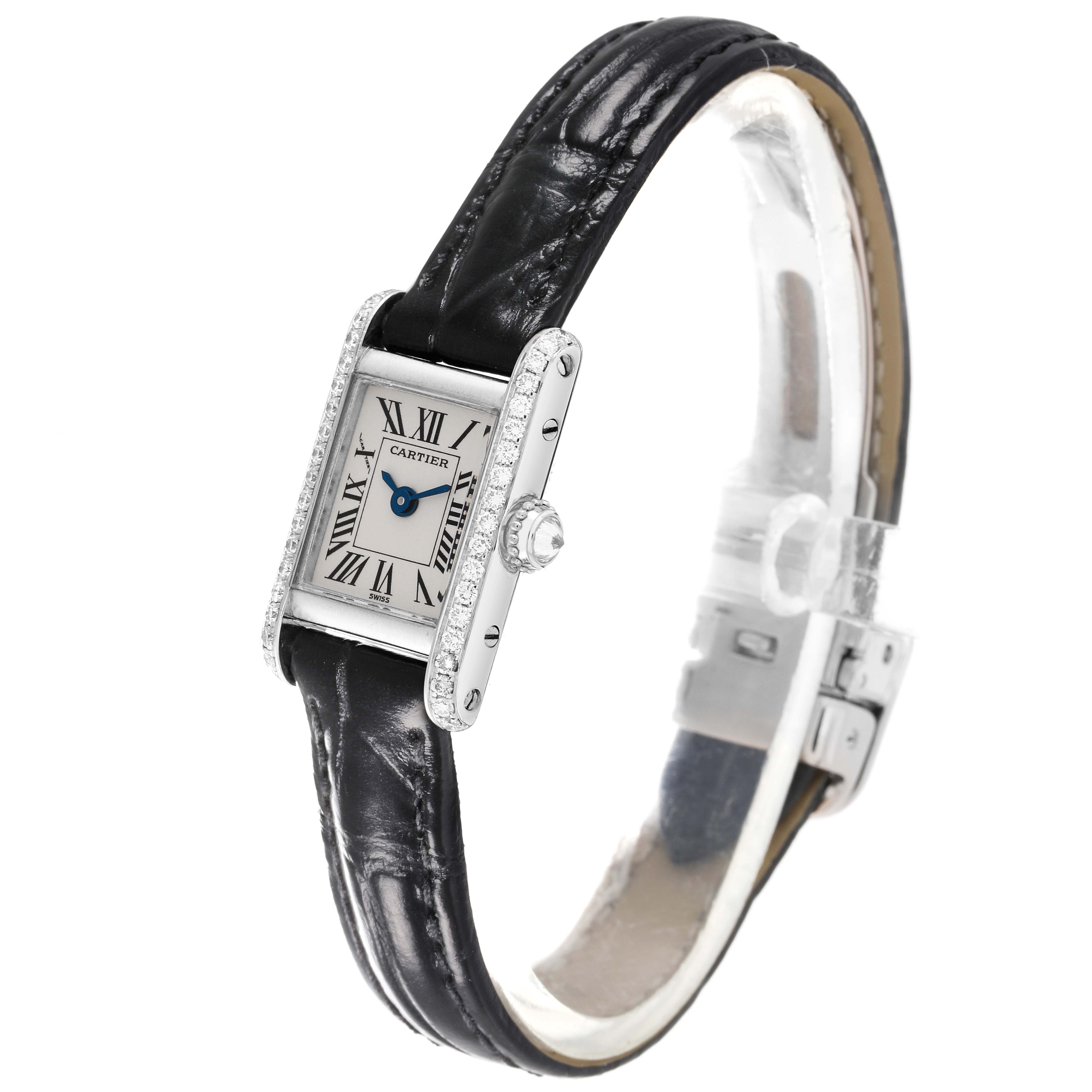 This image shows a Cartier Tank Américaine model watch at a three-quarter angle, highlighting the face, strap, and side details.