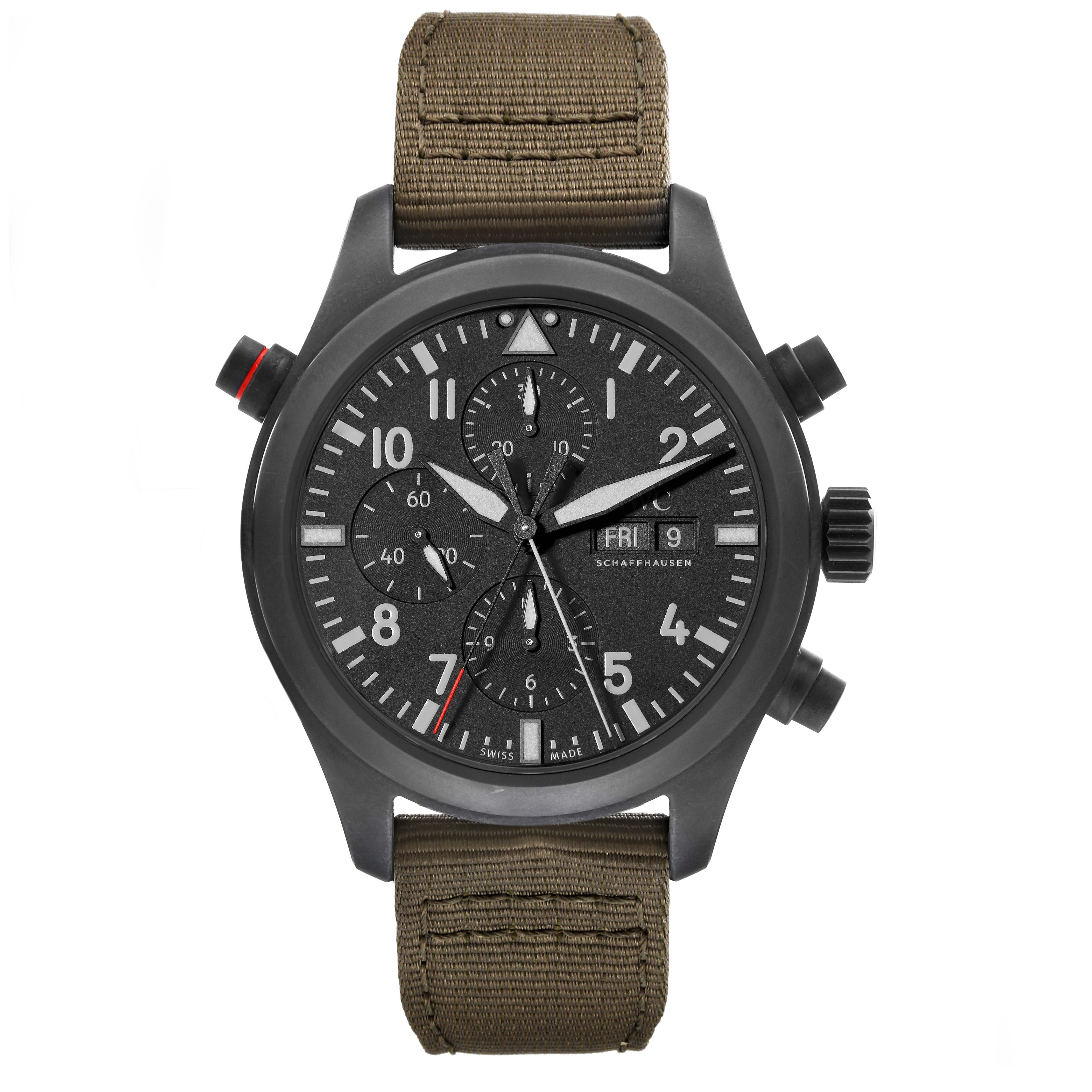 The image shows a front view of the IWC Pilot IW371815 Men's Titanium Black Dial IW371815 Men's Titanium Black Dial model watch with its face, buttons, and green fabric strap visible.
