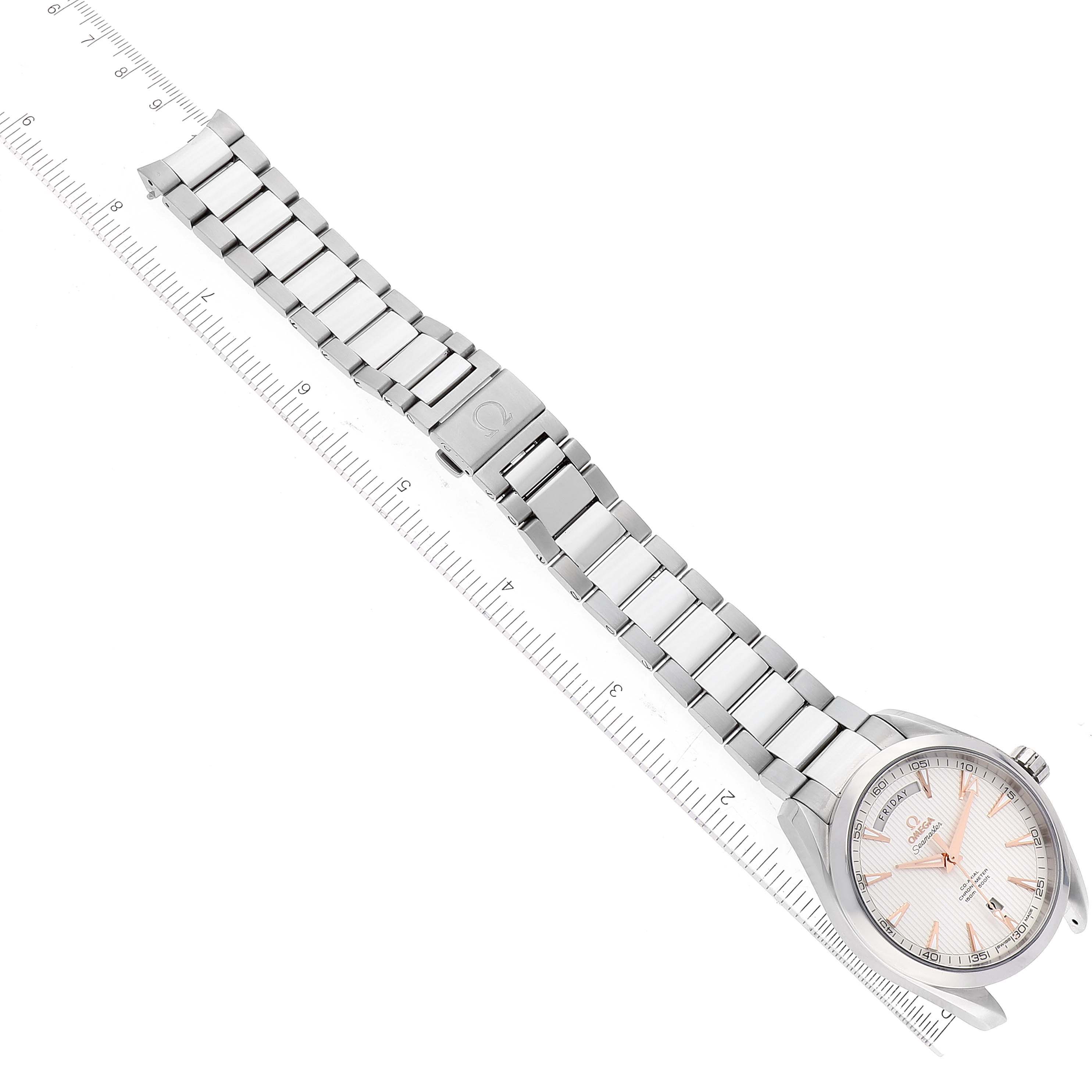 The image shows an Omega Aqua Terra 231.10.42.22.02.001 Men
s Stainless Steel Silver Dial 231.10.42.22.02.001 Men
s Stainless Steel Silver Dial watch laid flat with its stainless steel bracelet extended and partially measured with a ruler.