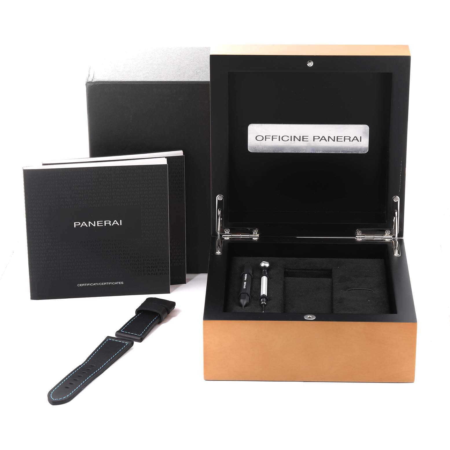 The image shows an open box for the Panerai Submersible PAM01305 Men's Stainless Steel Black Dial PAM01305 Men's Stainless Steel Black Dial watch, including replacement tools, a strap, and accompanying booklets.