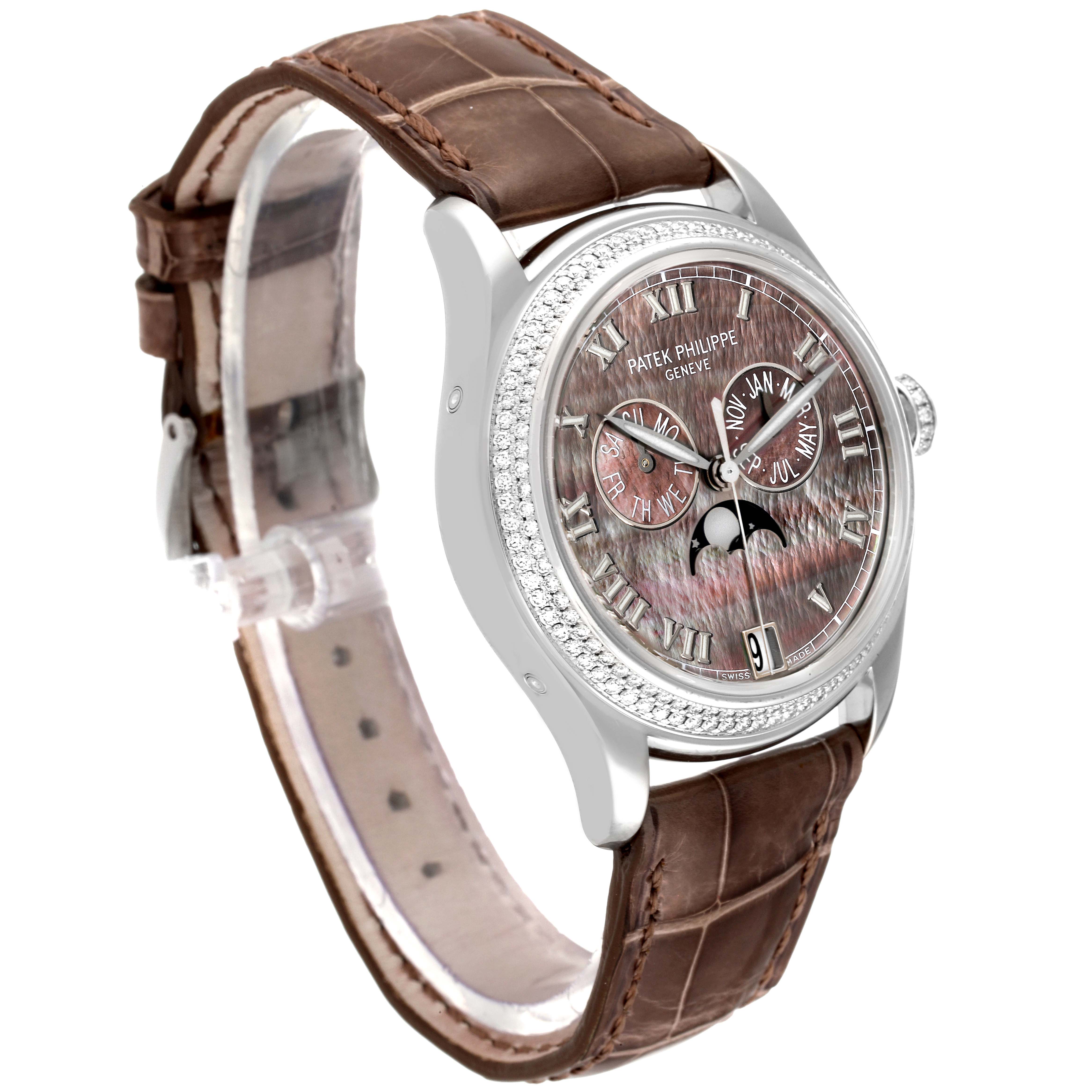 This image shows a side angle of the Patek Philippe Complications 4936G - 001 Men's White Gold Mother of Pearl Dial 4936G - 001 Men's White Gold Mother of Pearl Dial watch, highlighting the dial, bezel, and leather strap.