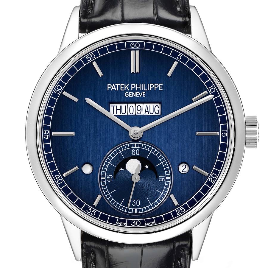 The Patek Philippe Complications model 5236P watch is shown from the front, displaying its blue dial, calendar feature, and subdial with moon phase indicator.