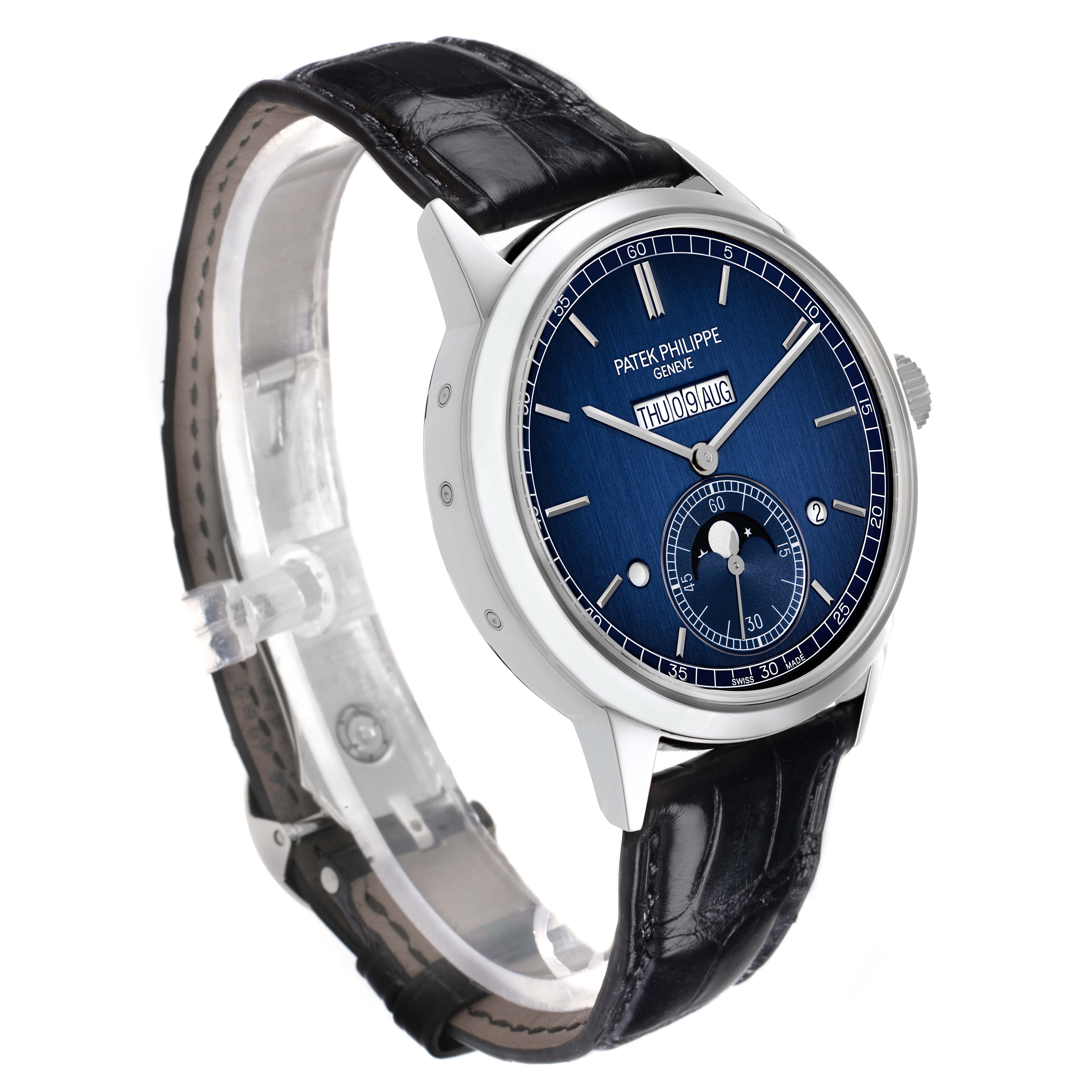 The Patek Philippe Complications 5236P Men's Platinum Blue Dial watch is shown at a side angle, highlighting the face, case, and leather strap.