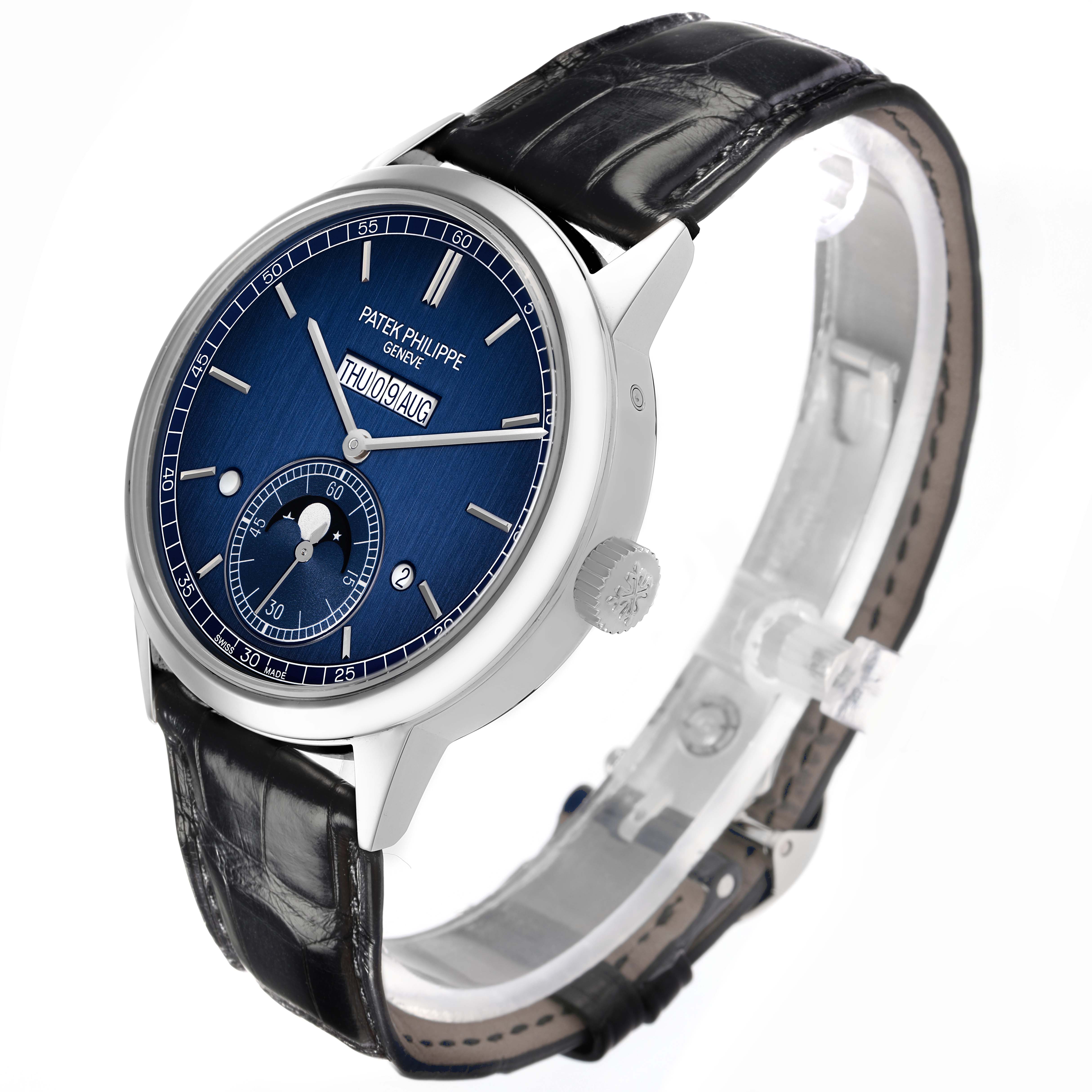 The Patek Philippe Complications 5236P Men's Platinum Blue Dial watch is shown from a three-quarter angle, highlighting its blue dial, crown, and leather strap.