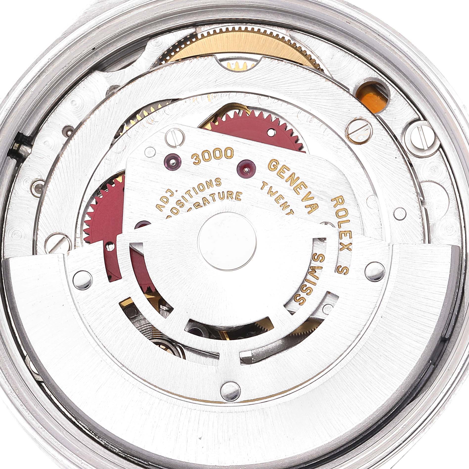 This image shows the internal mechanism of the Rolex Air-King 14000 Men's Stainless Steel Blue Dial 14000 Men's Stainless Steel Blue Dial watch, highlighting its gears and balance wheel from a top-down angle.