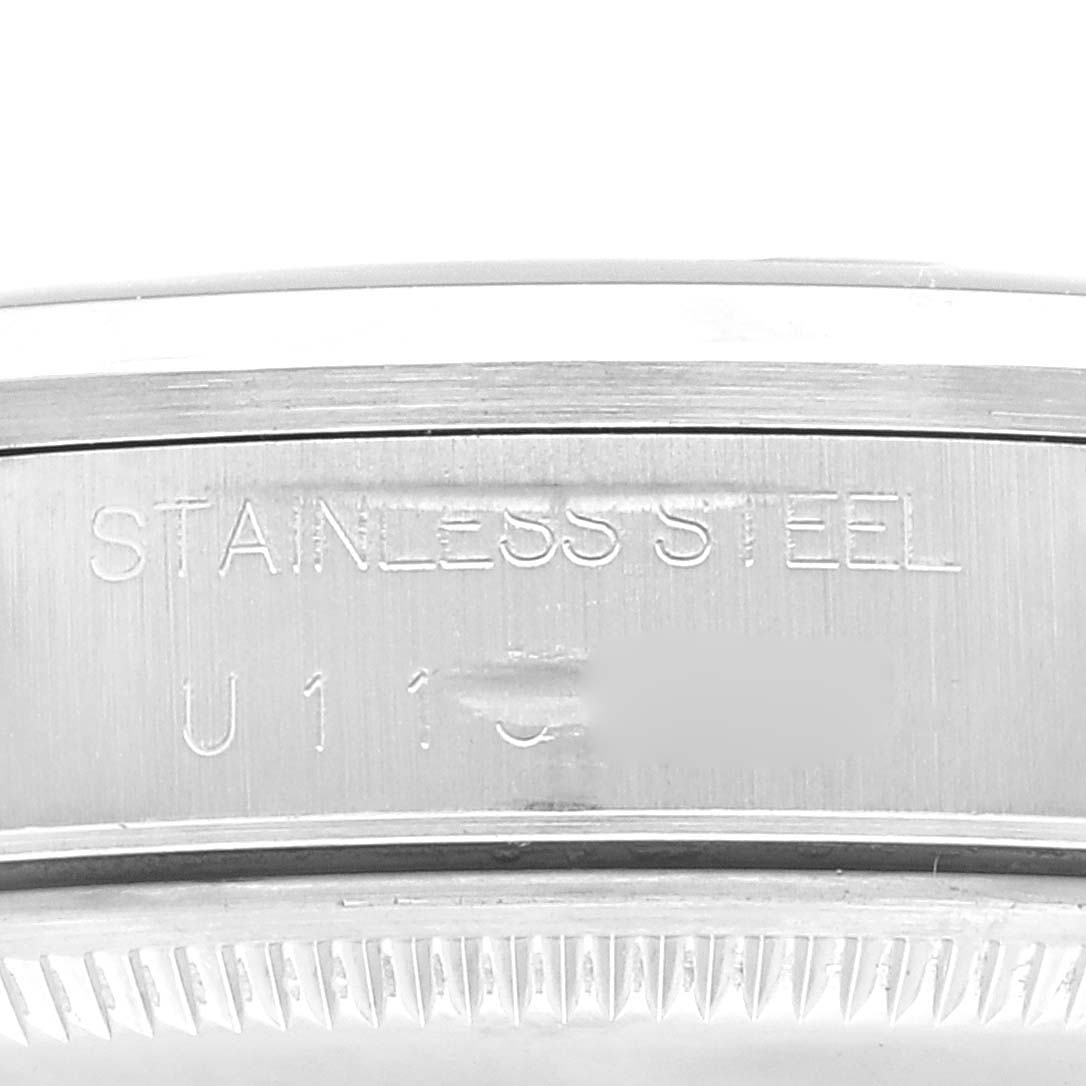 This close-up image shows the side engraving of a stainless steel case for a Rolex Air-King 14000 Men's Stainless Steel Blue Dial 14000 Men's Stainless Steel Blue Dial watch.