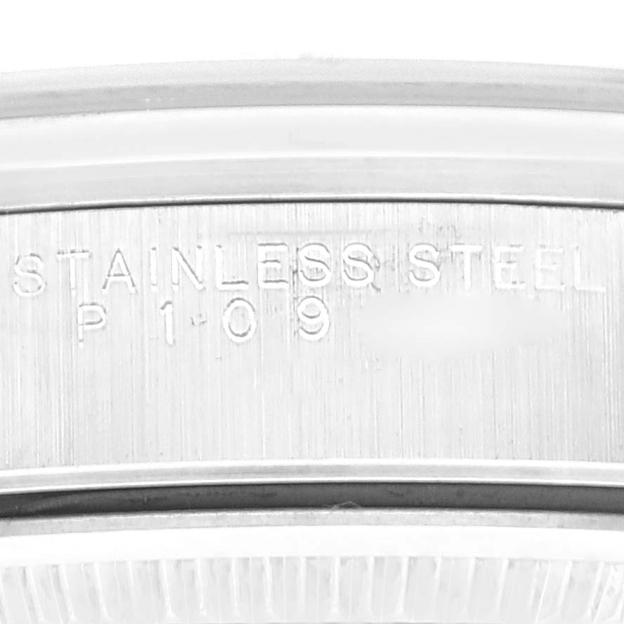 The image shows a detailed close-up of the Rolex Air-King 14000 Men's Stainless Steel Black Dial 14000 Men's Stainless Steel Black Dial watch's inner bezel, with "STAINLESS STEEL" and a serial number engraved.