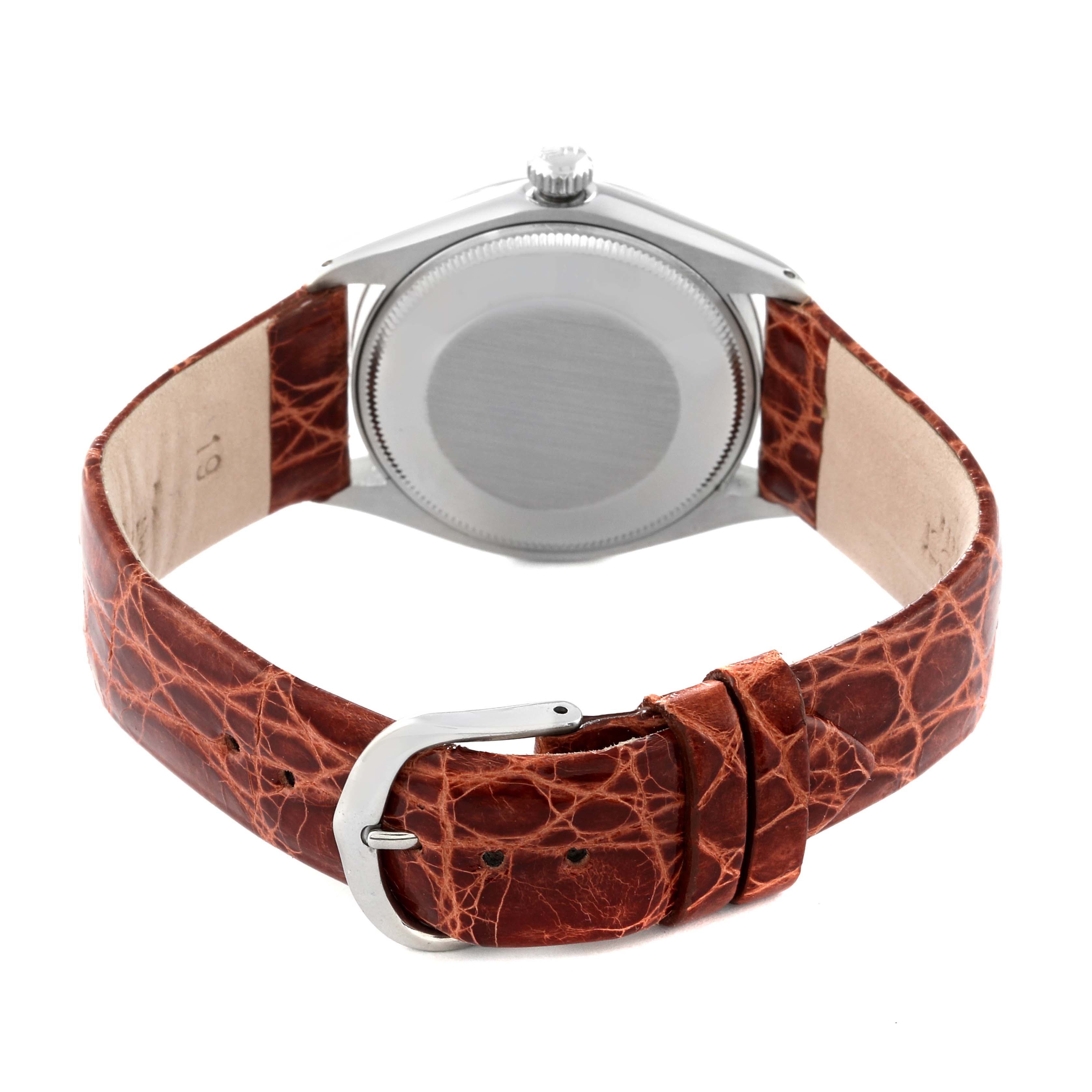 This is a rear view of the Rolex Vintage Collection 5500 Men's Stainless Steel Silver Dial 5500 Men's Stainless Steel Silver Dial watch, showcasing the case back and brown leather strap with a buckle.