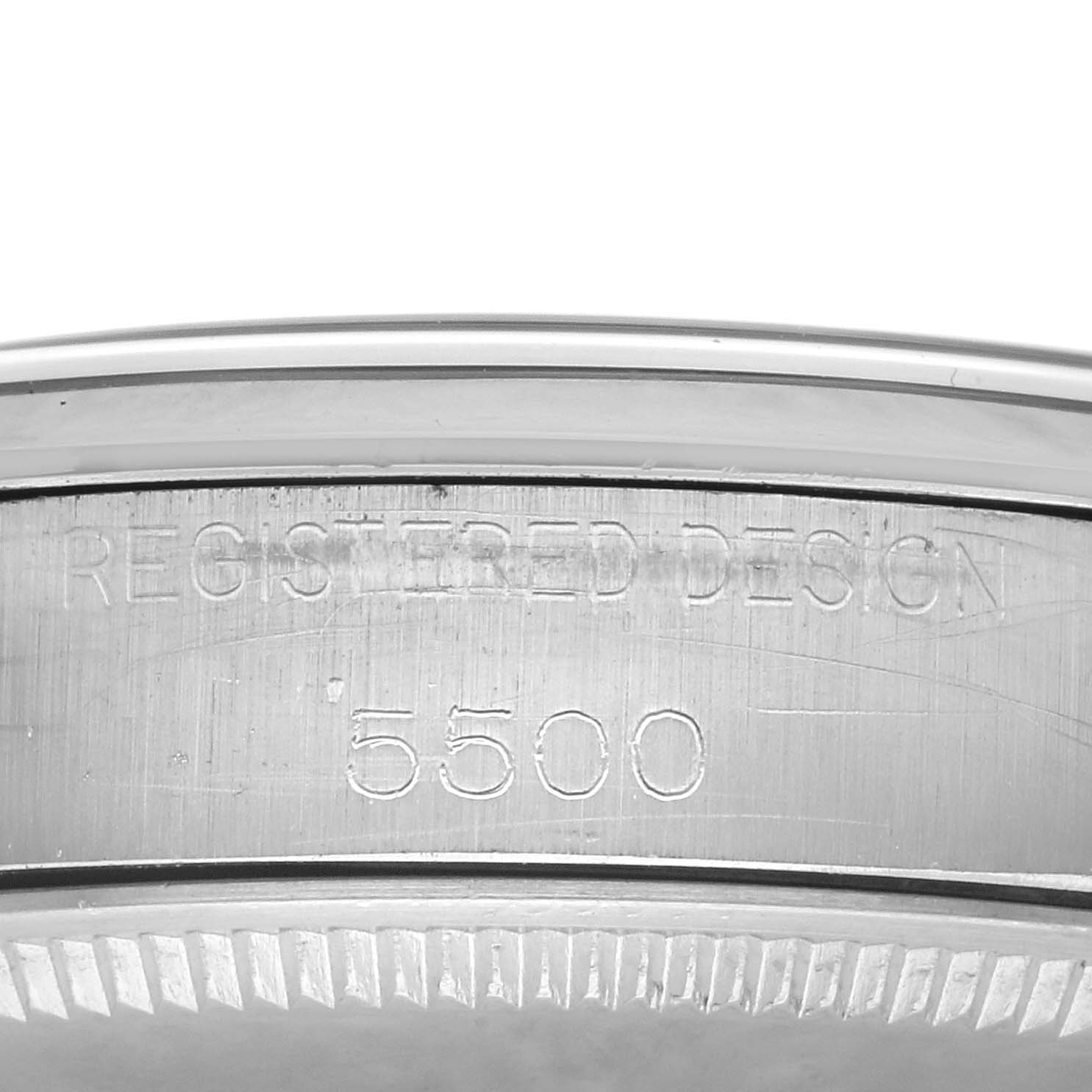 The image shows the side of the caseback for the Rolex Vintage Collection 5500 Men's Stainless Steel Silver Dial 5500 Men's Stainless Steel Silver Dial model, highlighting the engraved "REGISTERED DESIGN" and model number "5500."