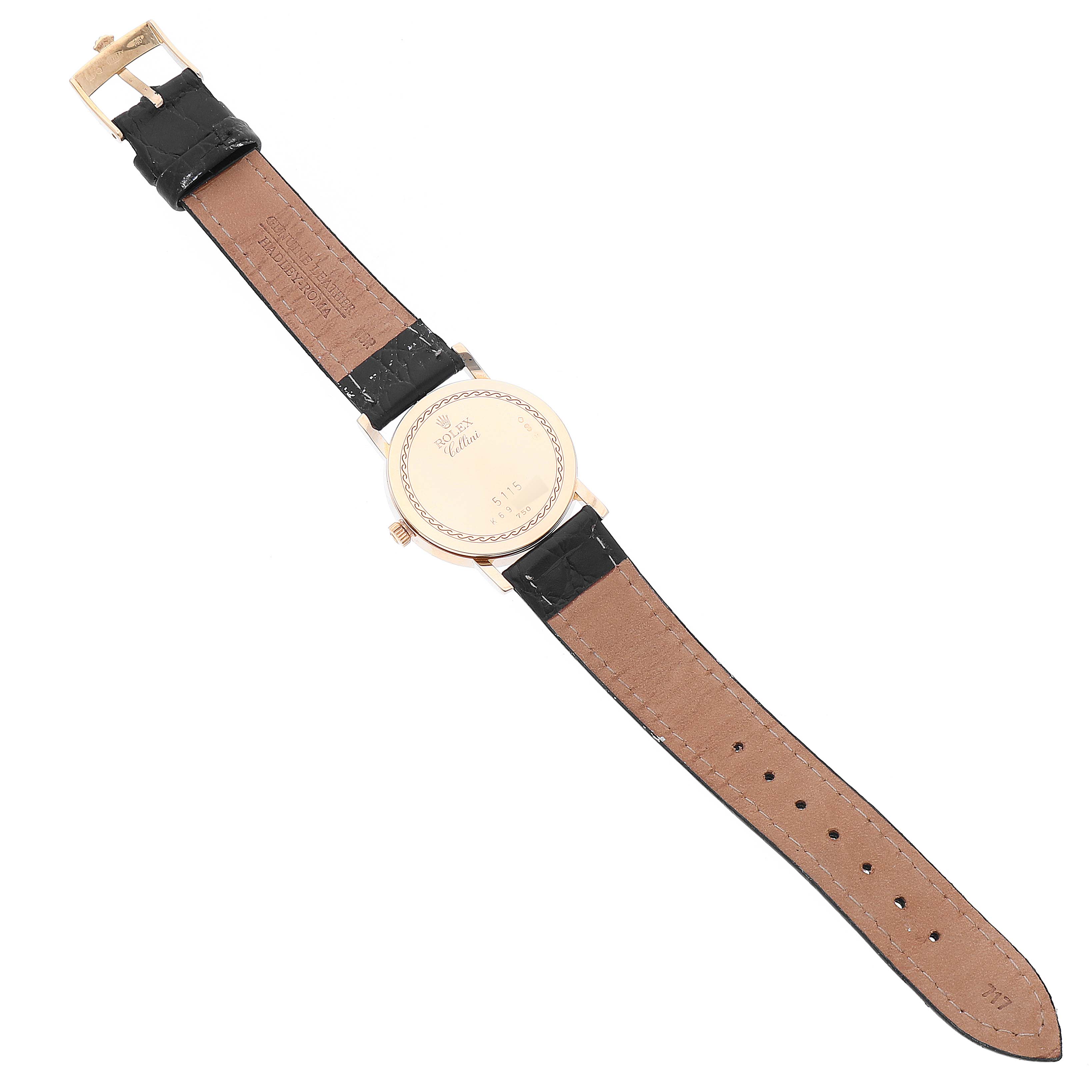 The image shows the backside of a Rolex Cellini 5115 Men's Yellow Gold Champagne Dial 5115 Men's Yellow Gold Champagne Dial watch, including the case back and leather strap.