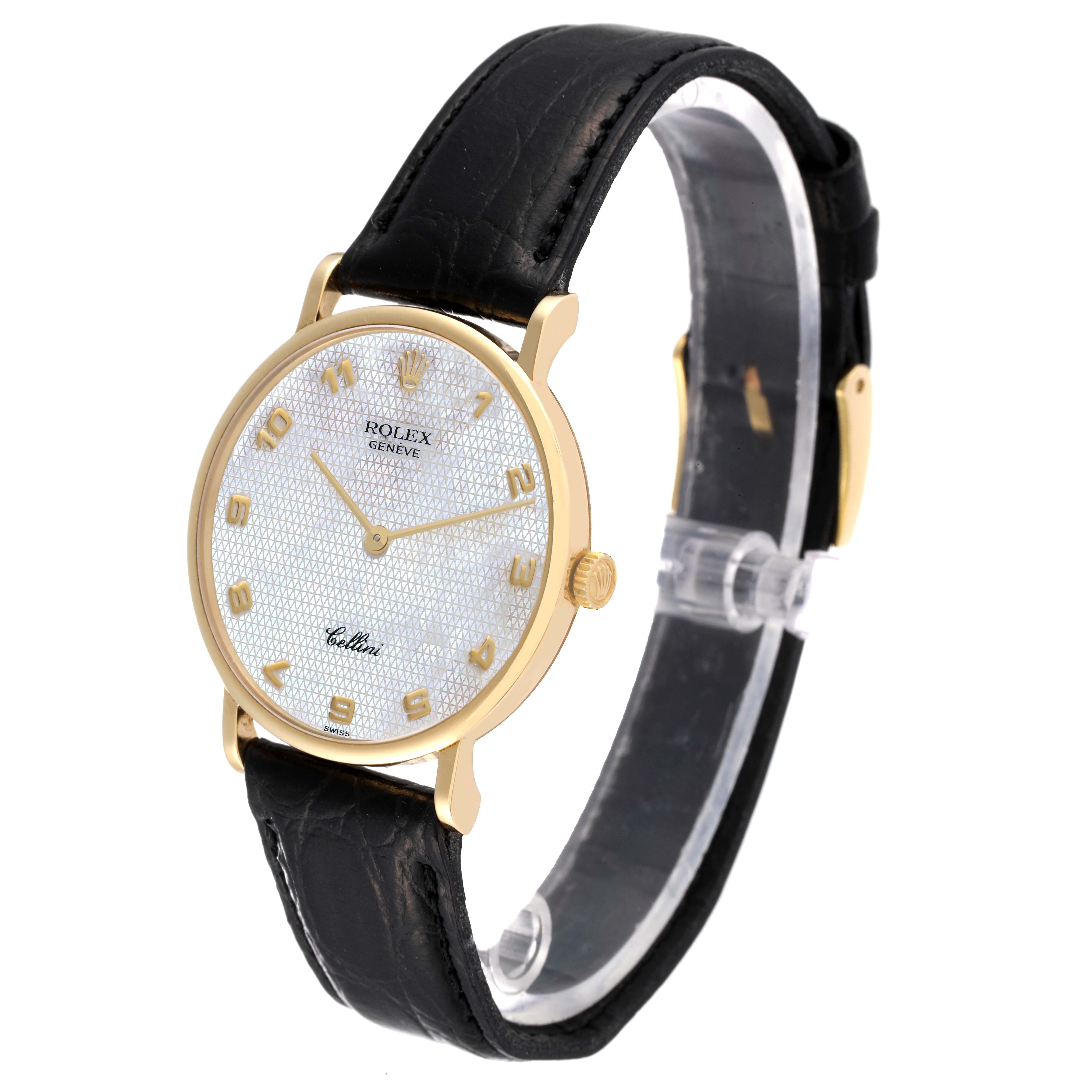 This image shows a Rolex Cellini 5112 Men's Yellow Gold Mother of Pearl Dial 5112 Men's Yellow Gold Mother of Pearl Dial watch from a tilted side angle, displaying its face, case, and black leather strap.