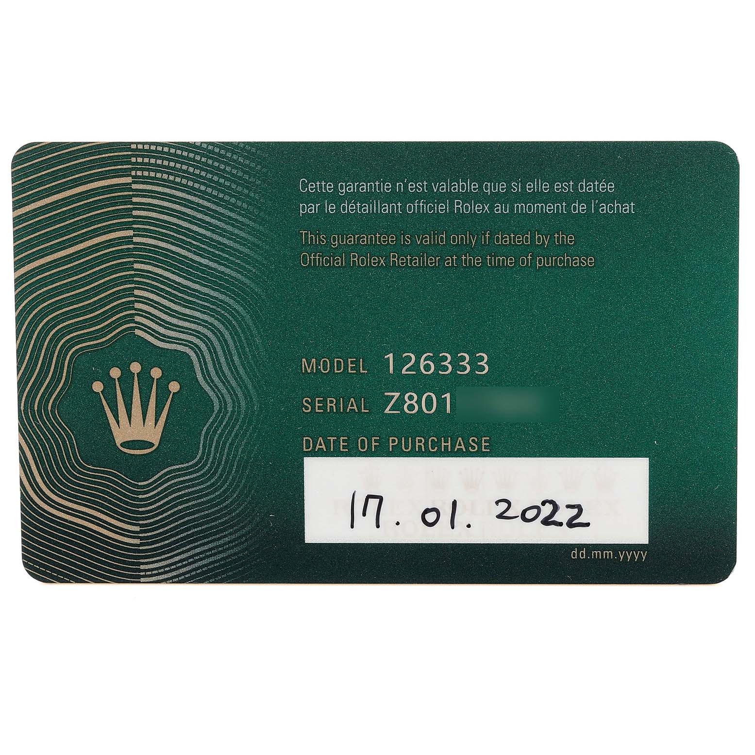 This image shows a guarantee card with model and serial numbers for a Rolex Datejust 41 126333 Men's Steel and Gold (two tone) Silver Dial 126333 Men's Steel and Gold (two tone) Silver Dial.