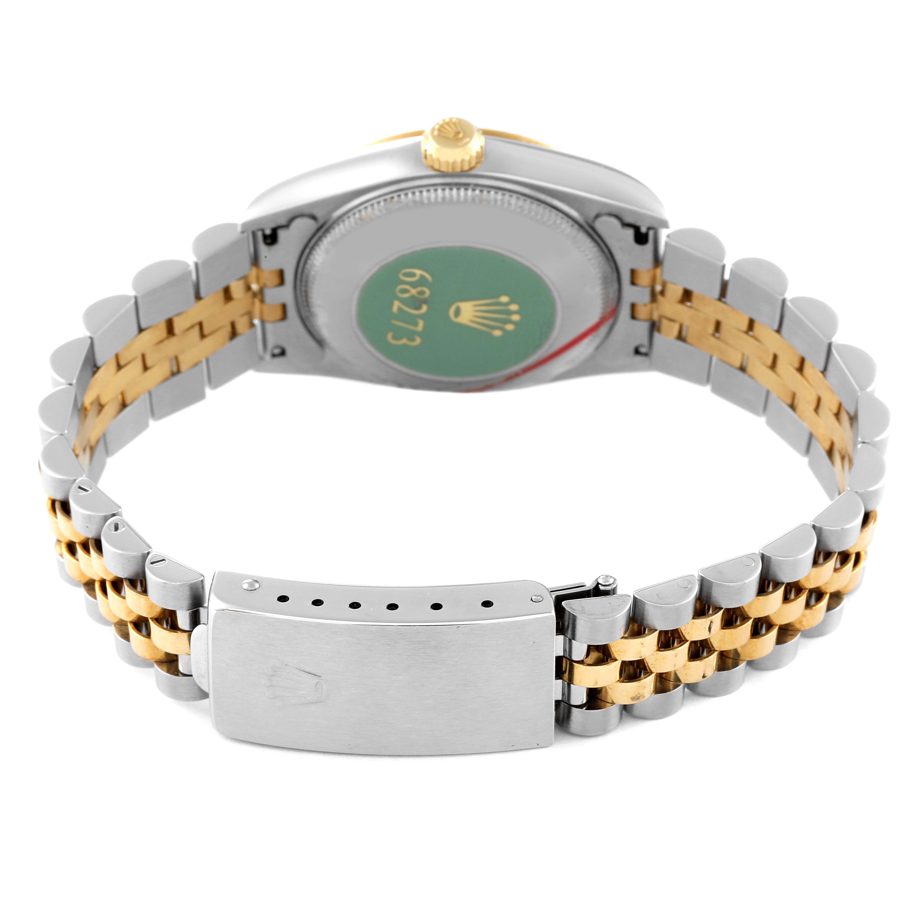 The image shows the back and clasp of a Rolex Mid-Size 68273 Women's Steel and Gold (two tone) Grey Dial 68273 Women's Steel and Gold (two tone) Grey Dial watch, displaying its two-tone metal bracelet.