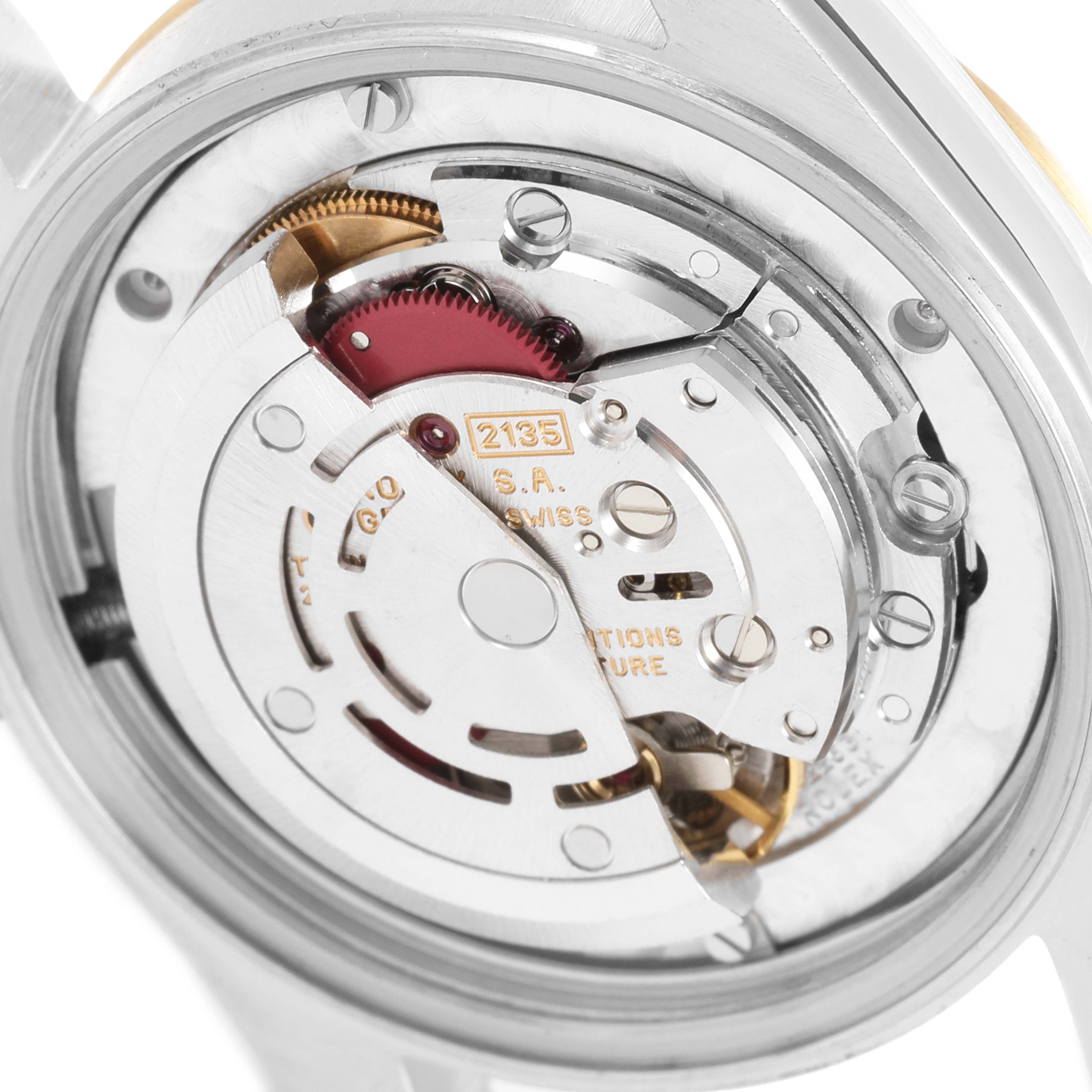 The image shows the internal movement mechanism of a Rolex Mid-Size 68273 Women's Steel and Gold (two tone) Champagne Dial 68273 Women's Steel and Gold (two tone) Champagne Dial model watch.