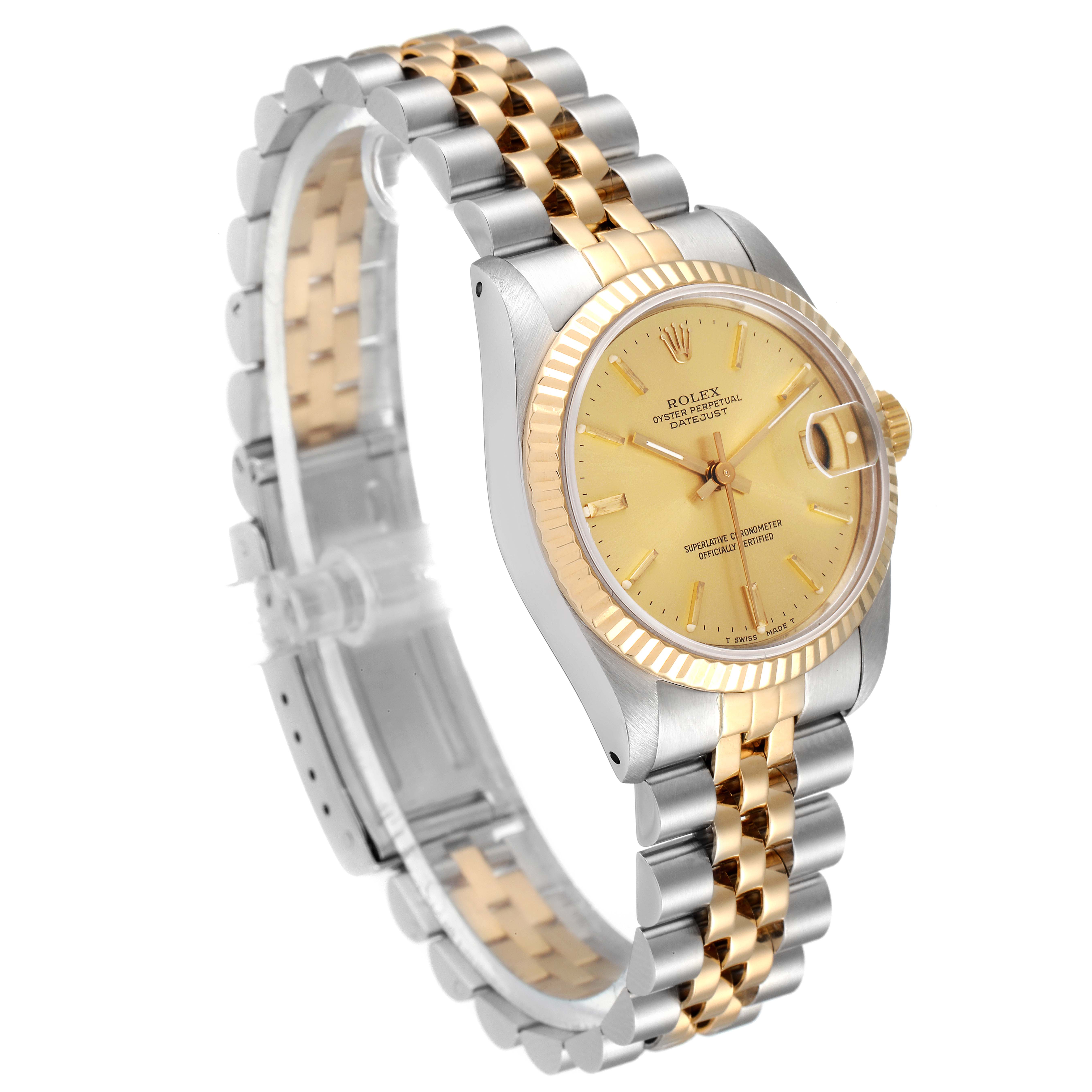 The image shows a side angled view of a Mid-Size Rolex watch, featuring the dial, bezel, and bracelet.