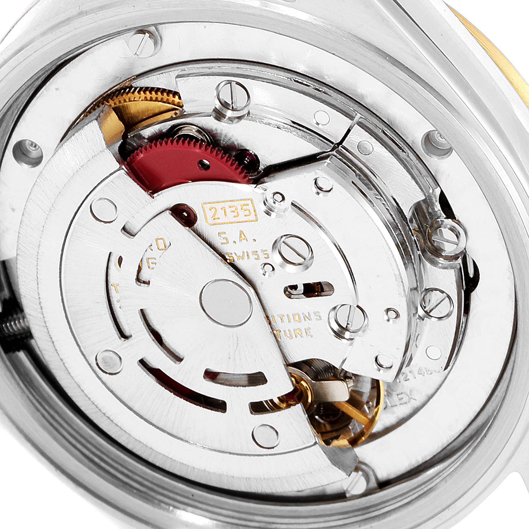 The image shows the internal mechanical movement of the Rolex Mid-Size 68273 Women
s Steel and Gold (two tone) Champagne Dial 68273 Women
s Steel and Gold (two tone) Champagne Dial watch at a close-up angle.