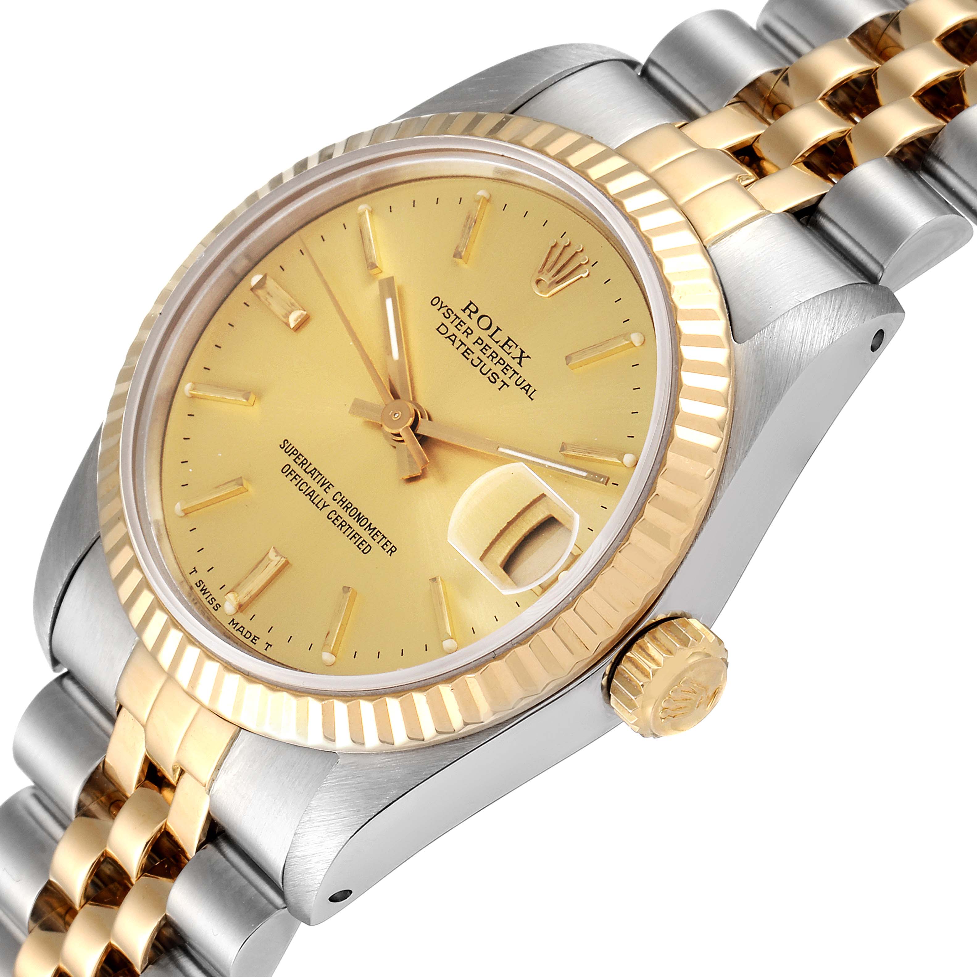This image shows a Rolex Mid-Size 68273 Women
s Steel and Gold (two tone) Champagne Dial 68273 Women
s Steel and Gold (two tone) Champagne Dial Datejust watch from an angle that highlights the dial, bezel, crown, and part of the bracelet.