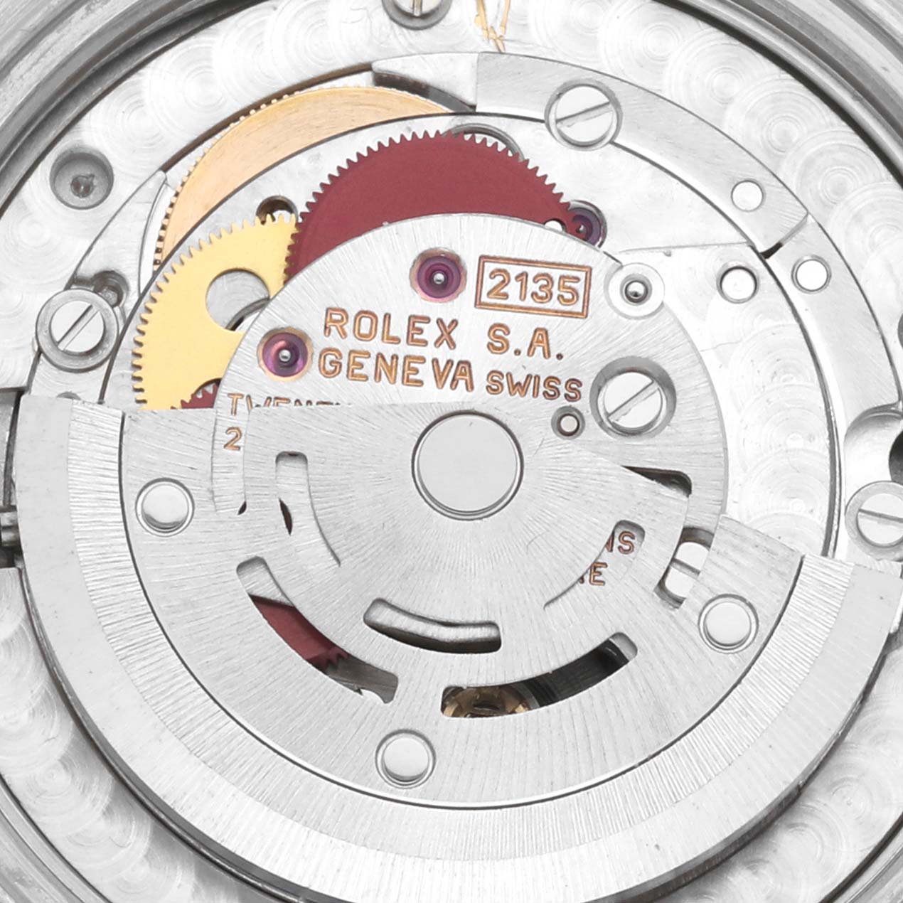 This image shows a close-up view of the inner mechanical movement parts of a Rolex Mid-Size 68273 Women's Steel and Gold (two tone) Mother of Pearl Dial 68273 Women's Steel and Gold (two tone) Mother of Pearl Dial watch model 2135.