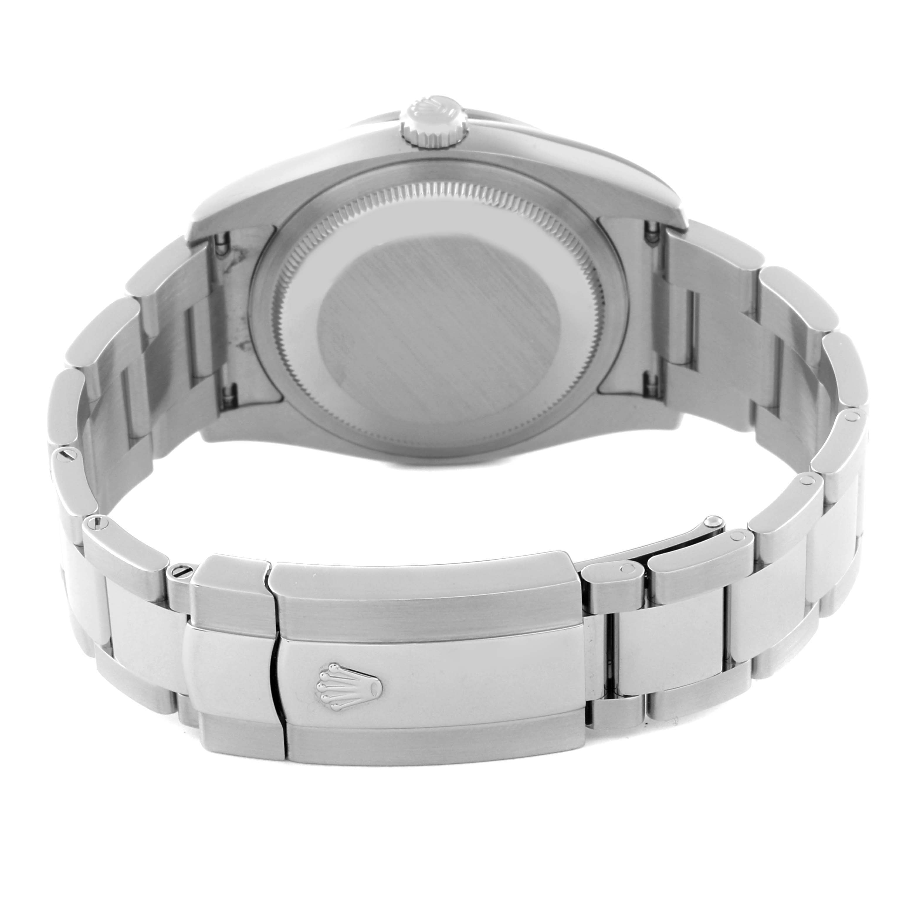 The image shows the back view of a Rolex Datejust 116244 Men's Stainless Steel Mother of Pearl Dial 116244 Men's Stainless Steel Mother of Pearl Dial watch, highlighting its case back and the oyster-style bracelet with the Rolex logo on the clasp.