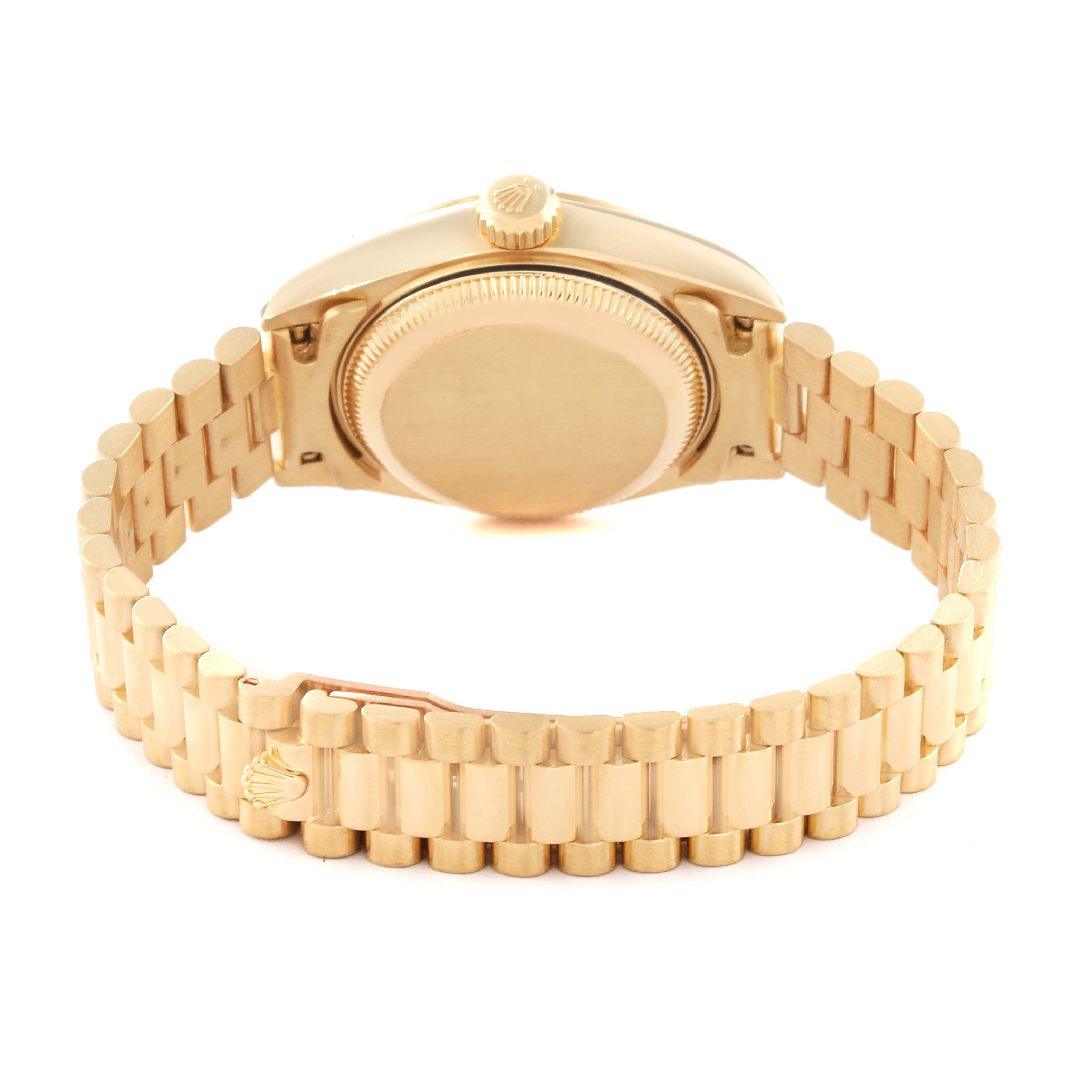 This image shows the case back and President bracelet of a Rolex President 69178 Women's Yellow Gold Champagne Dial 69178 Women's Yellow Gold Champagne Dial model watch from a rear angle.