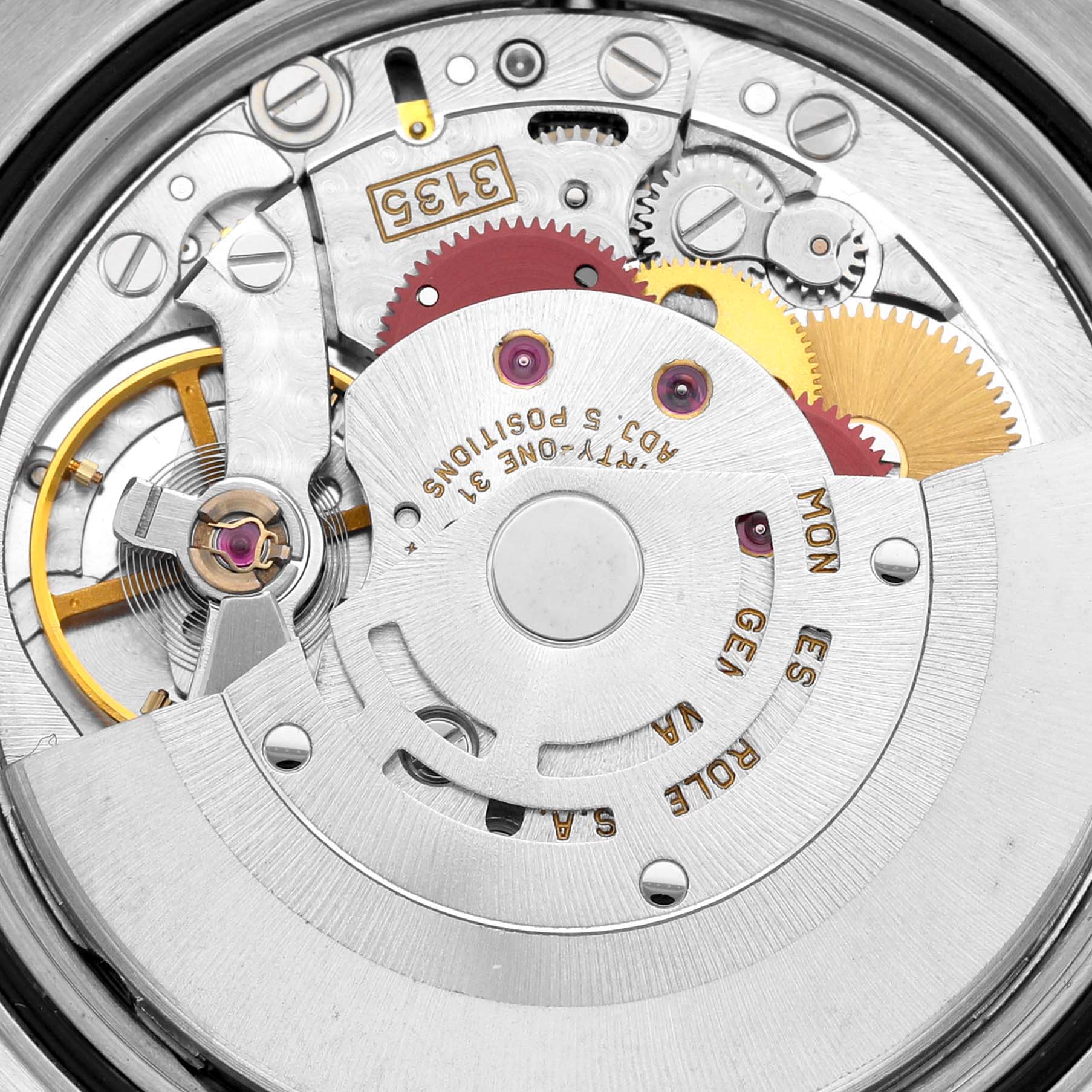 This image shows a close-up of the Rolex Datejust 16220 Men's Stainless Steel Silver Dial 16220 Men's Stainless Steel Silver Dial movement, highlighting the intricate gears and mechanisms.