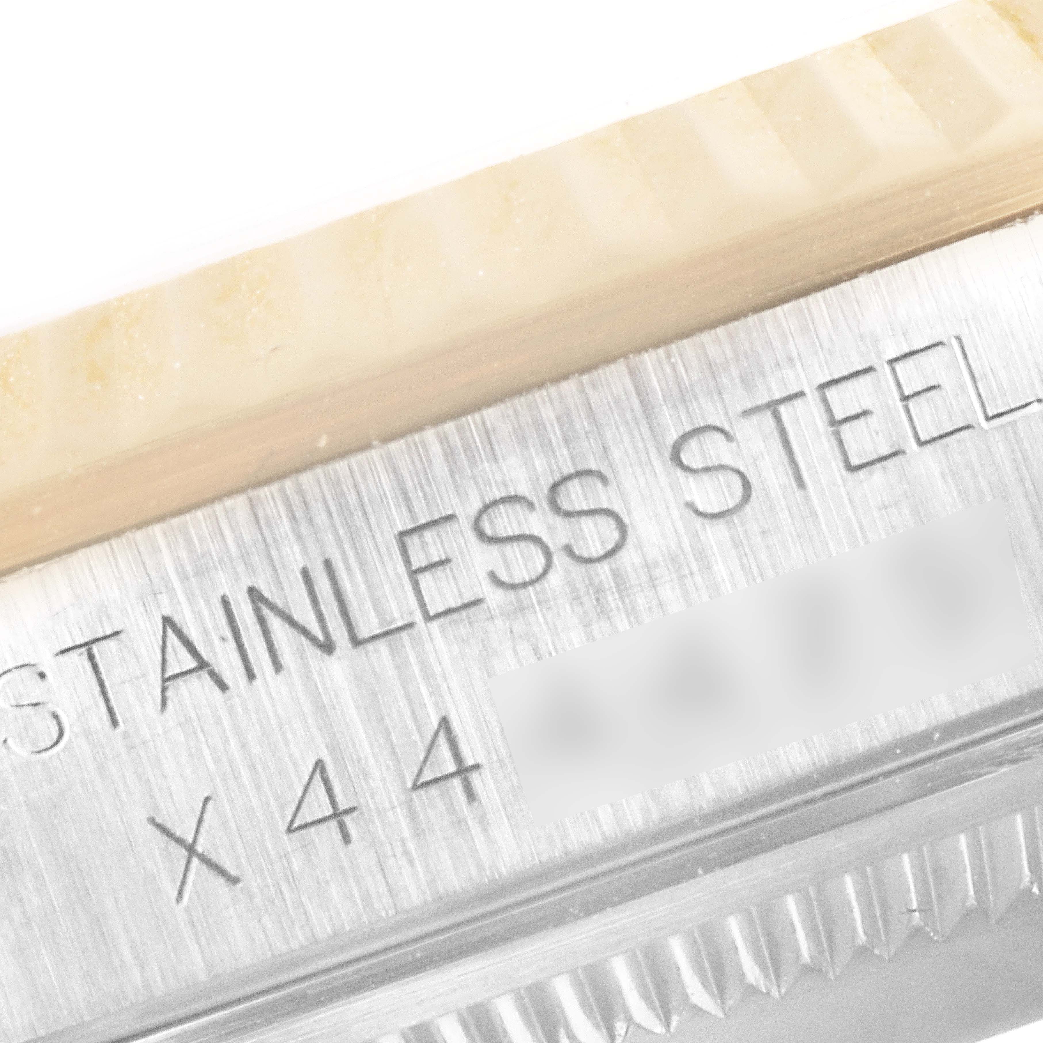 The image shows a close-up of the stainless steel side and bezel of a Rolex Datejust 16233 Men's Steel and Gold (two tone) Champagne Dial 16233 Men's Steel and Gold (two tone) Champagne Dial model watch.