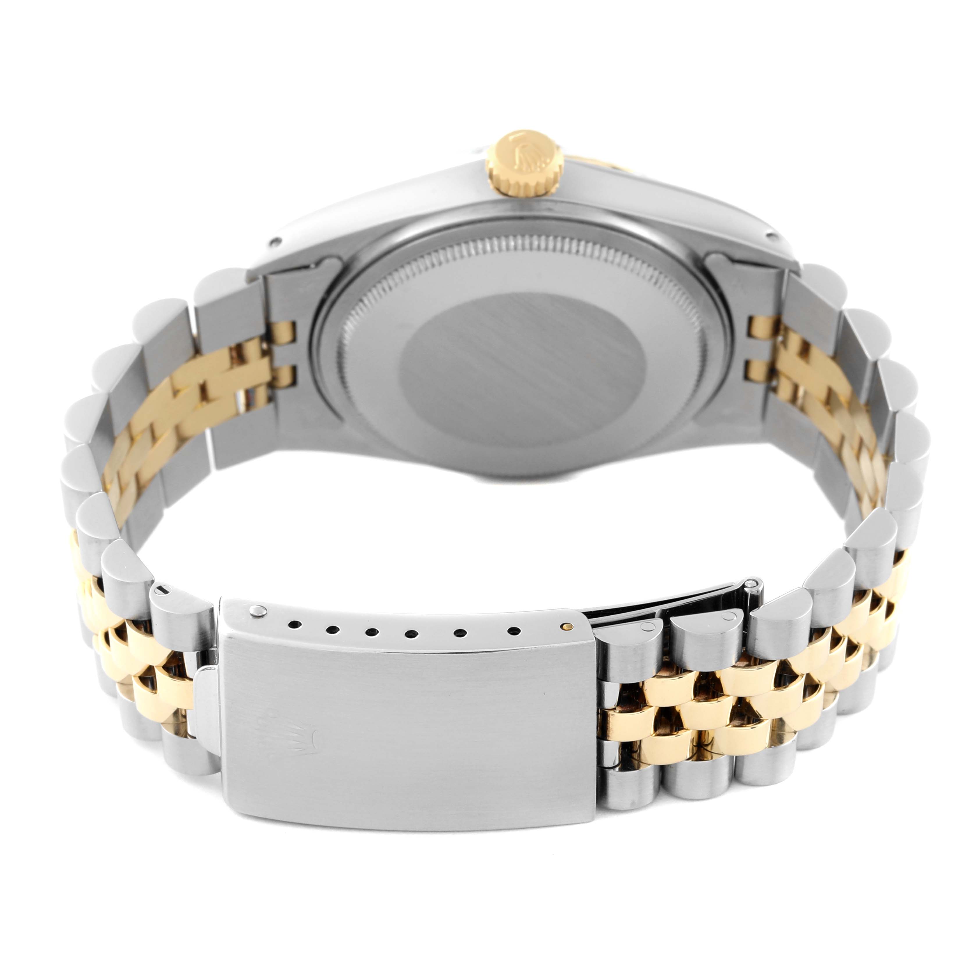 This image shows the back case and bracelet clasp of the Rolex Vintage Collection 16013 Men's Steel and Gold (two tone) Champagne Dial 16013 Men's Steel and Gold (two tone) Champagne Dial watch.