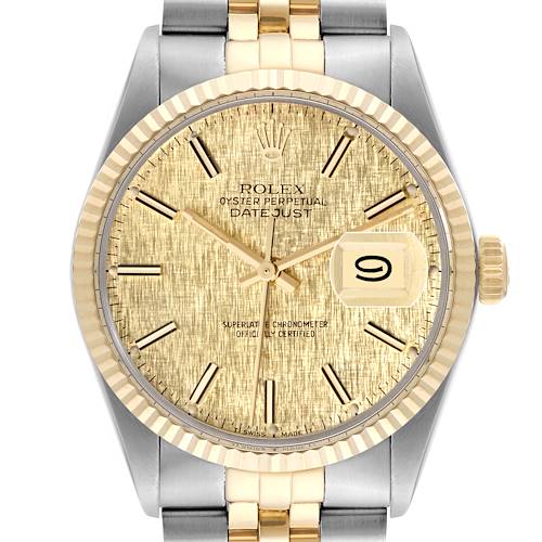 The image shows a frontal view of a Rolex Vintage Collection Datejust watch, highlighting the gold dial, date window, and two-tone bracelet.