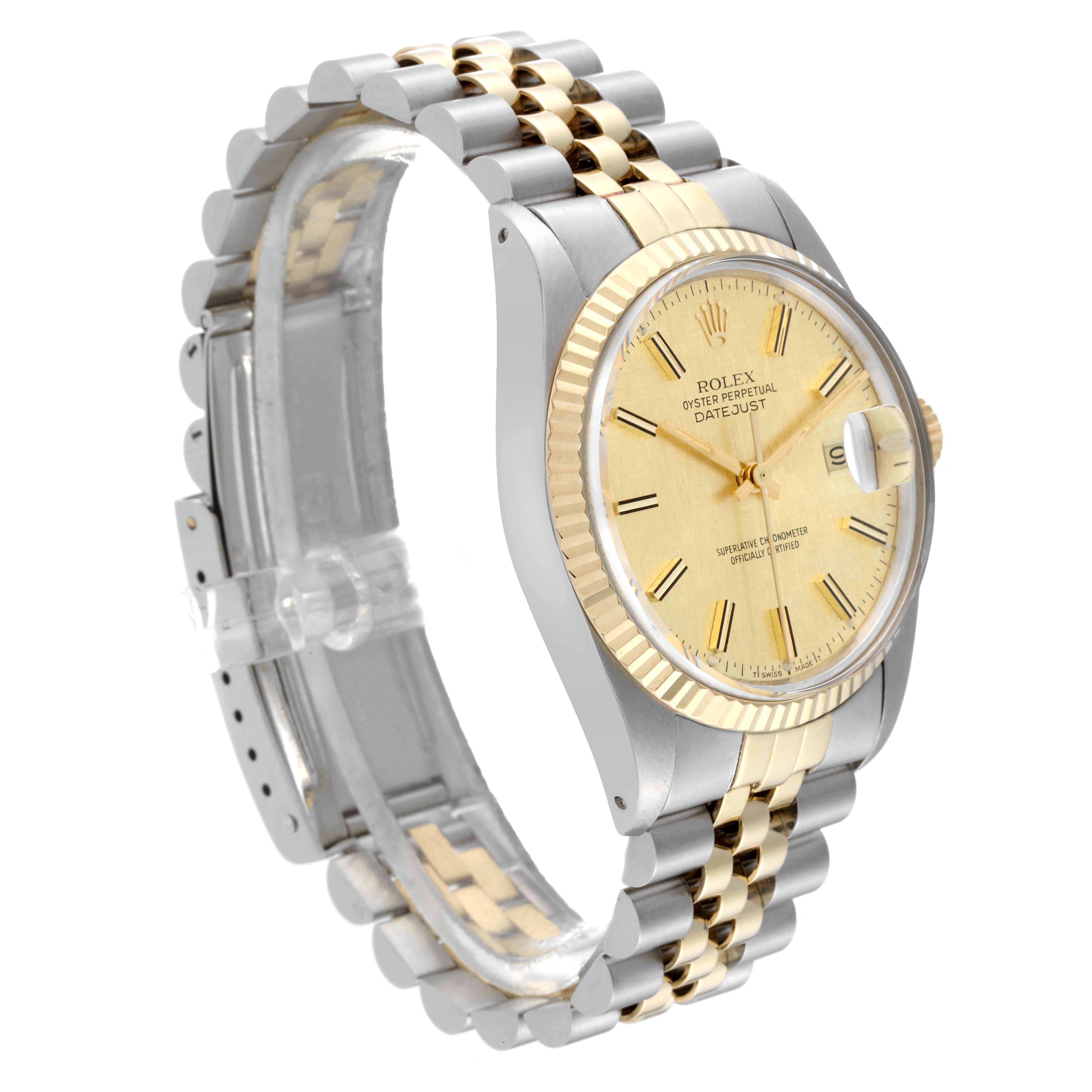 This image shows a side view of the Rolex Datejust from the Vintage Collection, highlighting its gold and silver bracelet and bezel.