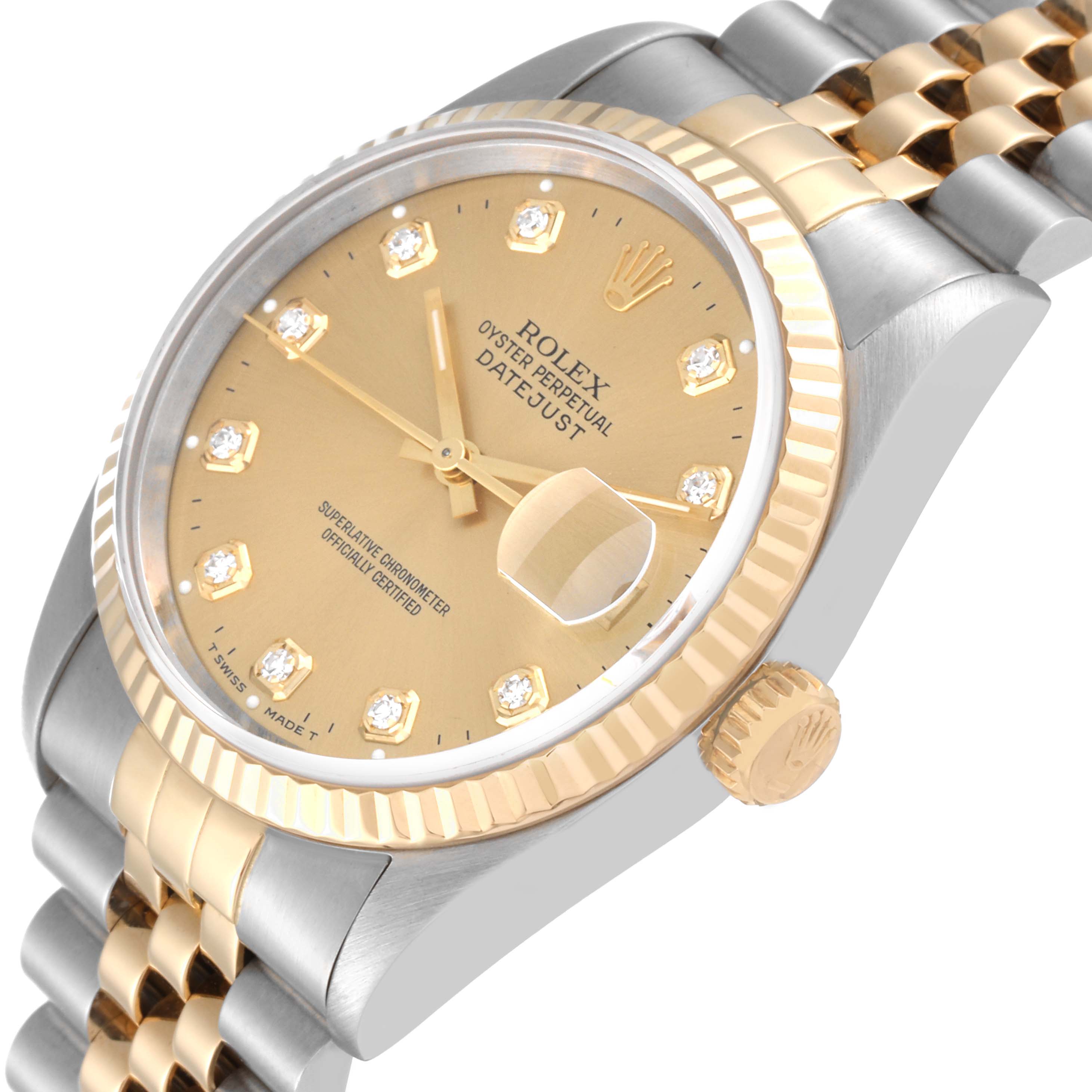This image shows a close-up, angled view of the face, bezel, and part of the bracelet of a Rolex Datejust 16233 Men's Steel and Gold (two tone) Champagne Dial 16233 Men's Steel and Gold (two tone) Champagne Dial watch.