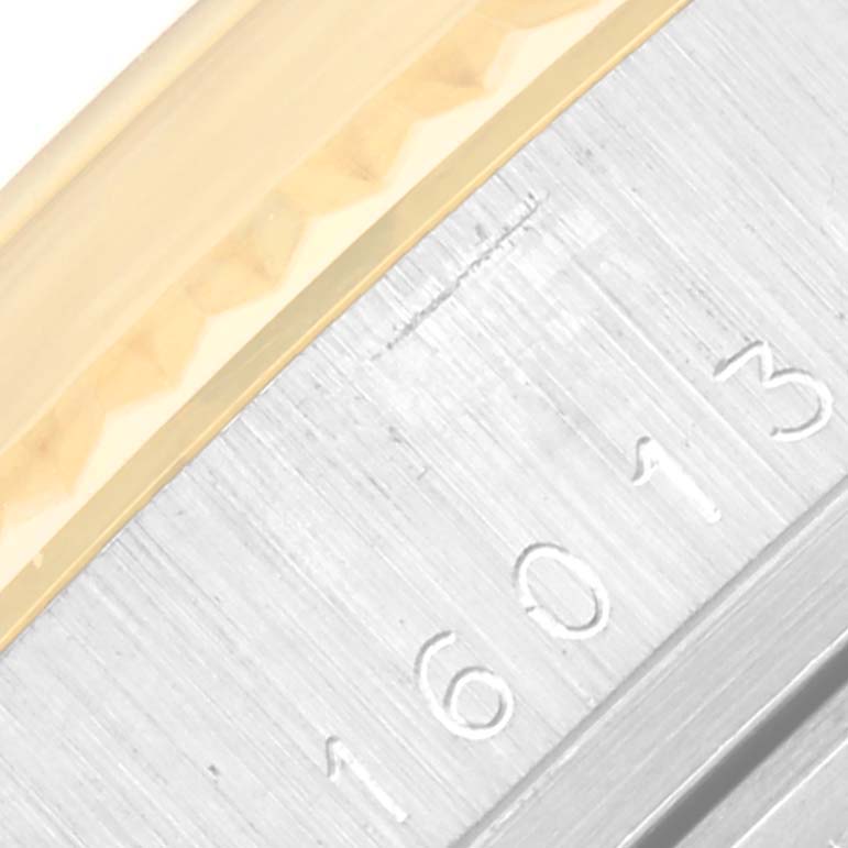 This close-up shows the serial number engraved on the case of the Rolex Vintage Collection 16013 Men's Steel and Gold (two tone) Champagne Dial 16013 Men's Steel and Gold (two tone) Champagne Dial model.