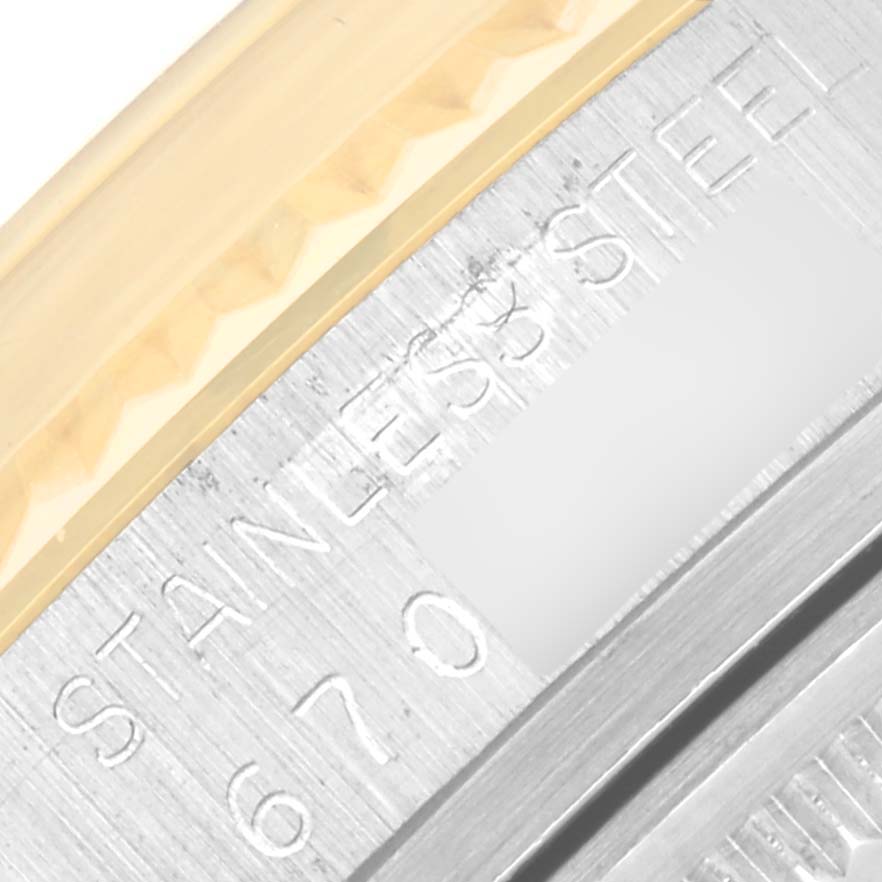 This close-up shows part of the case back with “STAINLESS STEEL” embossed on the Rolex Vintage Collection 16013 Men's Steel and Gold (two tone) Champagne Dial 16013 Men's Steel and Gold (two tone) Champagne Dial watch.