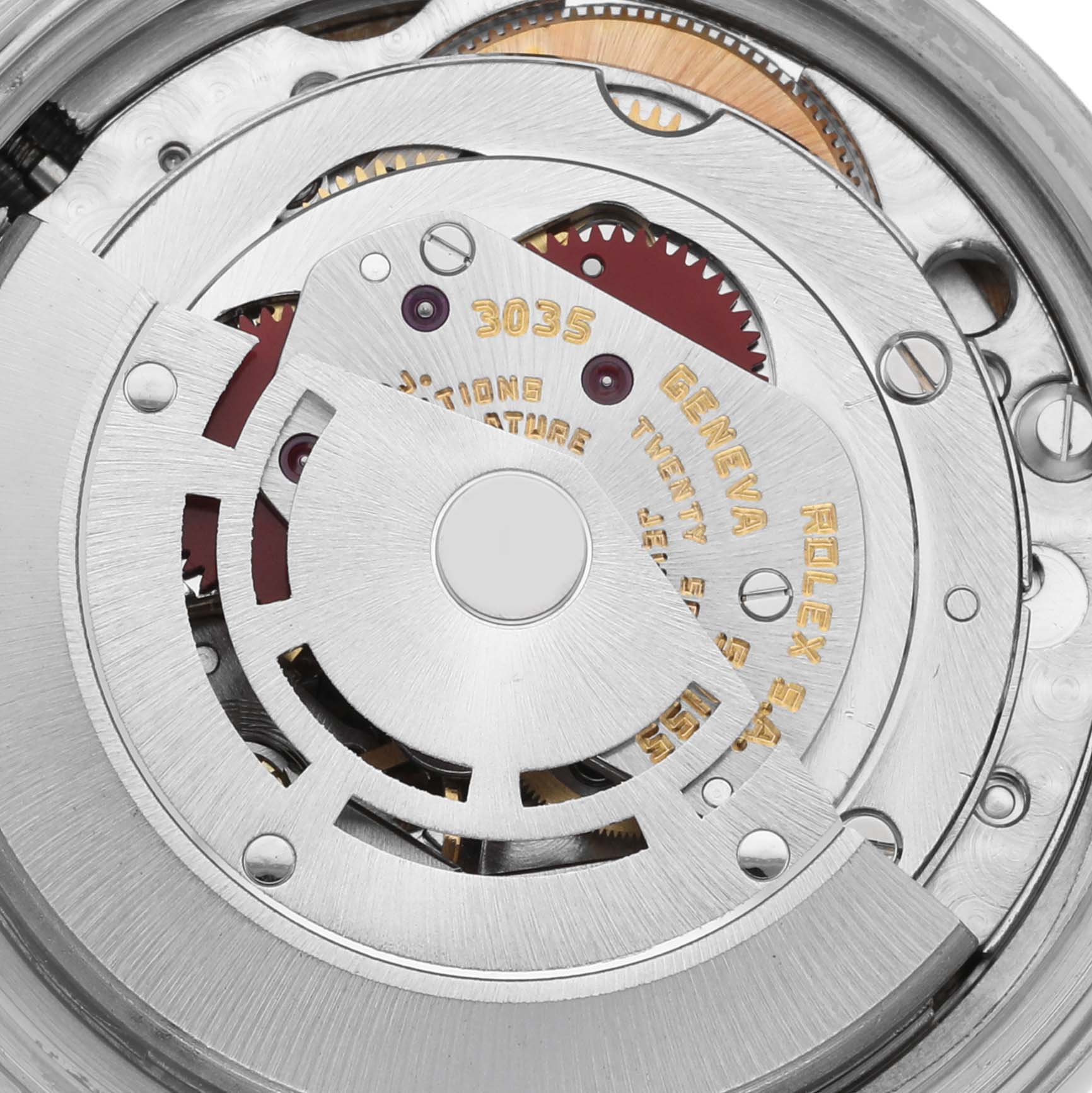 This image shows a close-up of the movement mechanism inside a Vintage Collection Rolex watch.