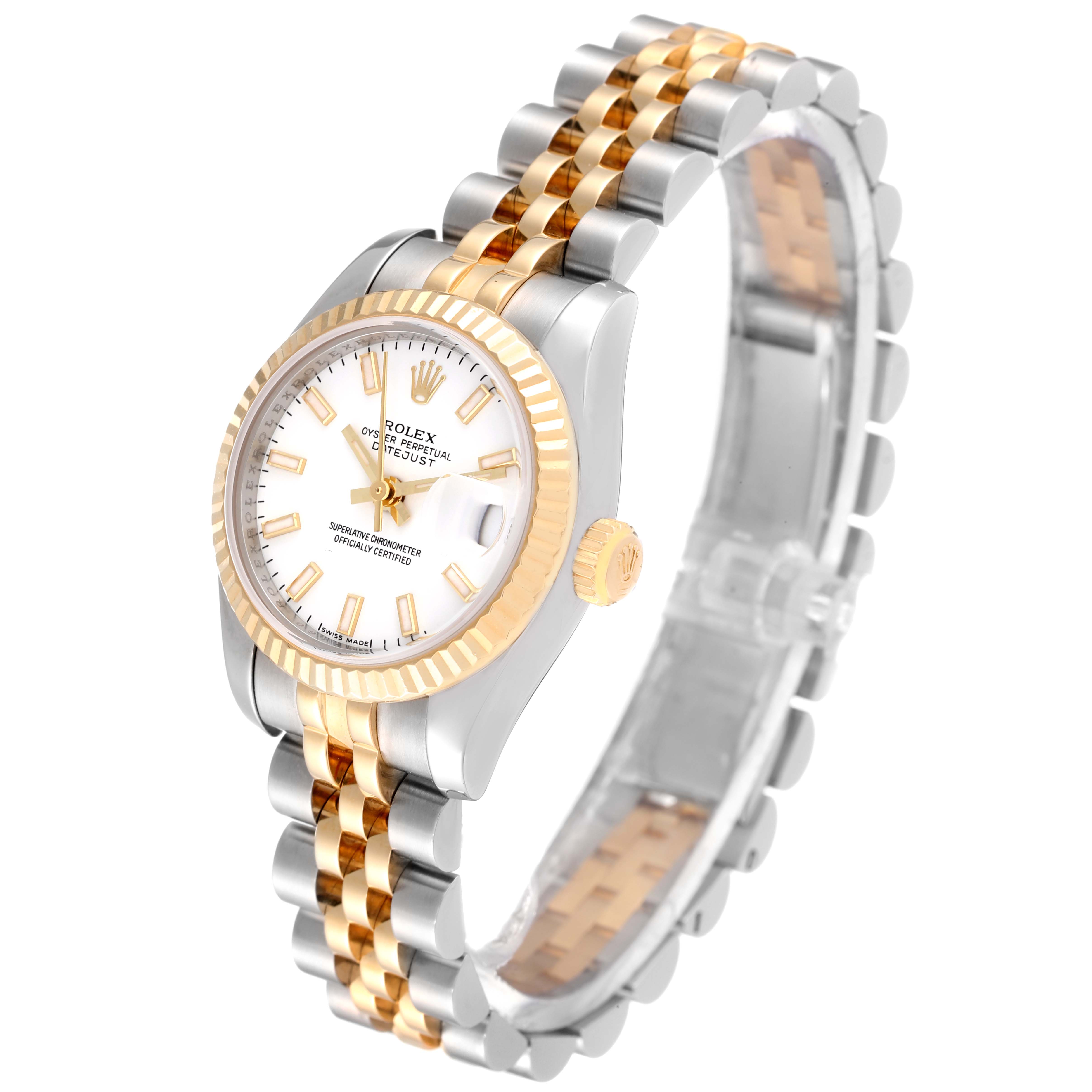 This image shows a Rolex Datejust 179173 Women
s Steel and Gold (two tone) White Dial 179173 Women
s Steel and Gold (two tone) White Dial watch from a three-quarter angle, highlighting the dial, fluted bezel, and two-tone bracelet.