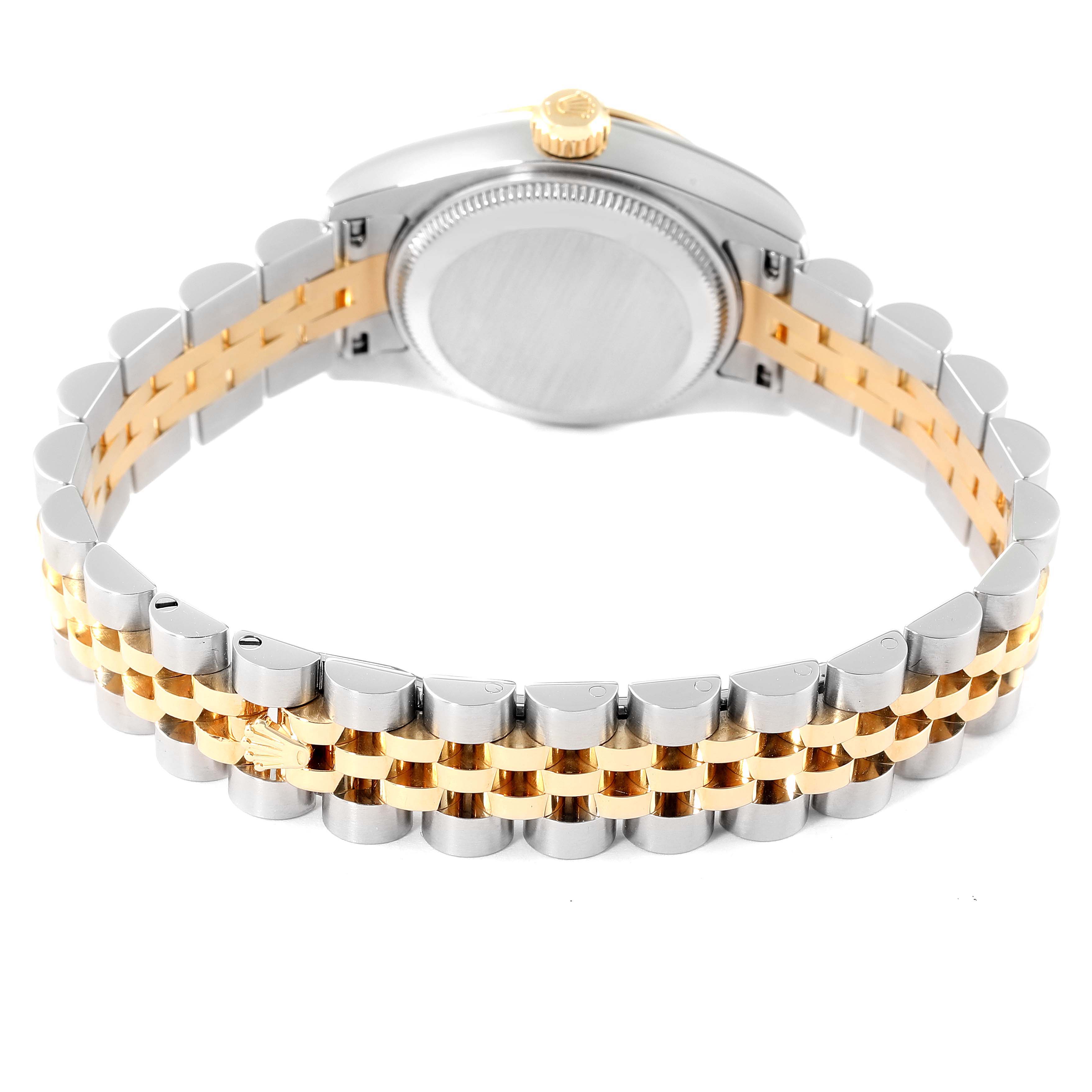 The image shows the back view of a Rolex Datejust 179173 Women
s Steel and Gold (two tone) White Dial 179173 Women
s Steel and Gold (two tone) White Dial watch, highlighting its two-tone bracelet and caseback.